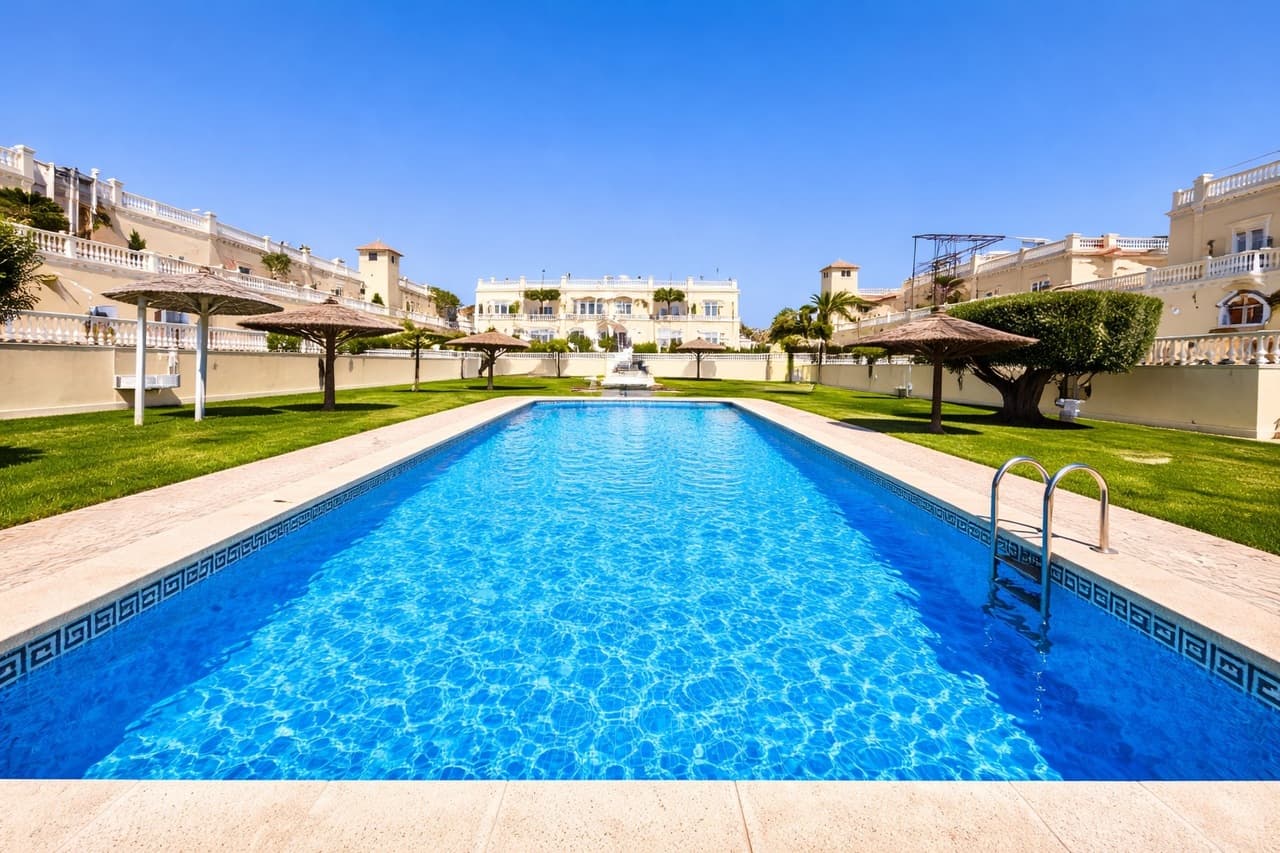 Discover this charming 3-bedroom, 2-bathroom semi-detached townhouse ideally located within walking distance of La Zenia Boulevard, offering the perfect blend of convenience, comfort, and Mediterranean outdoor living.At the front of the property, a sun-drenched private garden provides ample space not only for relaxing but also for secure off-road parking. To the rear, a spacious terrace opens directly onto the beautifully maintained communal pool area, creating a seamless indoor-outdoor lifestyle perfect for entertaining, sunbathing, or enjoying family time.The ground floor features a bright and welcoming living and dining area, a fully equipped kitchen, and a convenient double bedroom, ideal for guests or single-level living.Upstairs, you’ll find two generous bedrooms, each with its own private terrace, offering peaceful spots to enjoy morning coffee or evening sunsets. One of the terraces provides access to a private solarium, delivering additional outdoor space and panoramic views—perfect for soaking up the year-round sunshine. A well-appointed bathroom serves this level.Whether you’re searching for a permanent residence, holiday retreat, or investment property, this home offers an unbeatable location, fantastic outdoor spaces, and direct access to communal amenities—all just moments from shops, restaurants, and beaches.