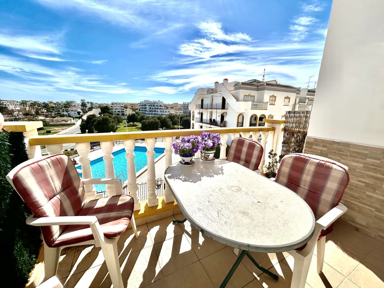 This beautifully presented south-facing penthouse is located in the highly desirable Molino Blanco urbanisation, in the heart of La Zenia. Enjoying an elevated position overlooking the communal pool, the property offers both privacy and attractive open views within a well-maintained residential setting.The apartment features 3 spacious bedrooms and 2 modern bathrooms, with a bright and airy living area that benefits from its south-facing orientation, filling the home with natural light throughout the day. A generous terrace provides the perfect space for outdoor dining and relaxing while enjoying views over the landscaped gardens and pool.One of the standout features of this property is its private rooftop solarium, offering additional outdoor living space ideal for sunbathing, entertaining, or simply enjoying the Mediterranean climate in complete privacy.The location is exceptional — just a few steps from a wide selection of bars, restaurants, and local shops, with the popular La Zenia Boulevard only a short walk away. The sandy shores of La Zenia Beach are also within easy walking distance, making this an ideal home for both holidays and year-round living.Whether you’re seeking a permanent residence, a holiday getaway, or a strong rental investment, this penthouse offers space, sunshine, and an unbeatable location in one of the most sought-after areas of the Costa Blanca.