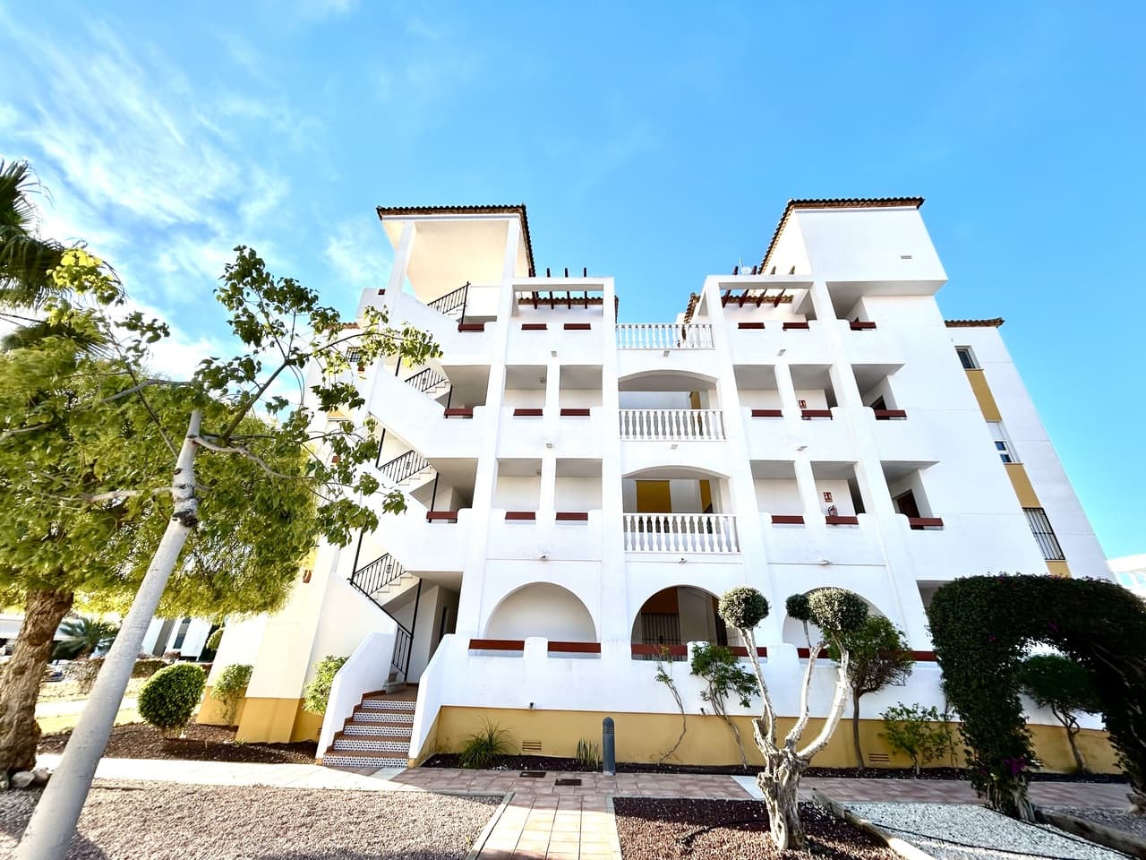 Located in the ever-popular area of Villamartín, just moments from the vibrant La Fuente Commercial Center, this beautifully presented 2-bedroom, 2-bathroom apartment offers the perfect blend of comfort, convenience, and coastal living.Set within a well-maintained community with lush gardens and a communal pool, the property also benefits from private parking—adding both ease and practicality.The apartment enjoys a desirable south-east orientation, filling the home with natural light throughout the day. As you enter, you are welcomed by a spacious hallway leading to a modern family bathroom and a well-proportioned second bedroom—ideal for guests or family.Moving through the property, you’ll find a bright and airy living area with an open-plan kitchen, designed for both relaxation and entertaining. Large sliding doors lead out onto a sunny balcony, where you can enjoy your morning coffee while taking in lovely sea views.The master bedroom is generously sized and features its own en-suite bathroom, along with direct access to the balcony—creating a retreat to unwind and enjoy the Mediterranean climate.Perfectly located within walking distance to a wide selection of restaurants, bars, and amenities, and just a short drive to golf courses and beaches, this apartment is ideal as a permanent home, holiday getaway, or investment opportunity in one of the Costa Blanca’s most desirable locations.