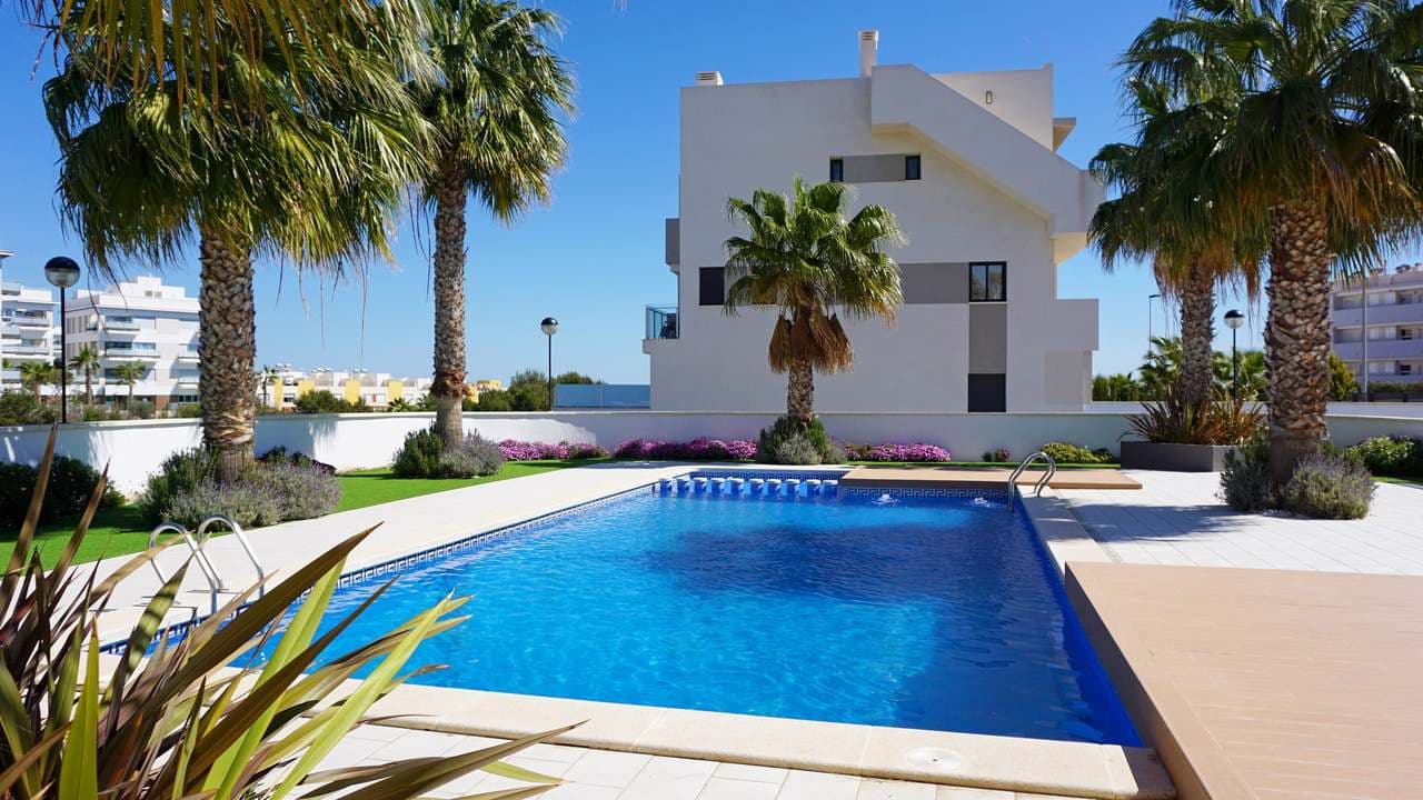 Luxury 3-Bedroom Penthouse in Los Dolses – Stunning Views, Gym & Prime LocationThis stunning resale 3-bedroom, 2-bathroom penthouse in Los Dolses, near La Zenia, offers the perfect combination of modern comfort and Mediterranean charm. Located in a prestigious gated complex, this penthouse boasts a private solarium, stunning views, and access to top-class facilities, including a communal gym and swimming pools.Key Features:✅ Spacious & Bright Interiors – Open-plan living and dining area with floor-to-ceiling windows, filling the home with natural light.✅ 3 Double Bedrooms – Including a stylish master suite, all designed for relaxation.✅ 2 Modern Bathrooms – Featuring high-end finishes and contemporary fittings.✅ Fully Equipped Kitchen – Sleek and modern with high-quality appliances.✅ Expansive Private Solarium – Breathtaking panoramic views, ideal for sunbathing, dining, or entertaining.✅ Large Terrace – A perfect spot to enjoy your morning coffee or an evening drink.✅ Exclusive Amenities – Access to a communal gym, beautifully maintained gardens, and swimming pools.✅ Fully Furnished & Move-in Ready – Tastefully decorated and equipped for immediate enjoyment.Prime Location:🌴 Los Dolses & La Zenia Boulevard – Walking distance to top shopping, dining, and entertainment.🏖️ Beaches Nearby – A short drive to La Zenia & Playa Flamenca’s stunning sandy beaches.⛳ Golfers’ Paradise – Close to Villamartin, Las Ramblas, and Campoamor golf courses.🚍 Excellent Transport Links – Easy access to Alicante & Murcia airports, public transport, and major roads.With high rental potential, this penthouse is a perfect holiday home, permanent residence, or investment property in one of Costa Blanca’s most sought-after areas.📞 Contact us today to arrange a viewing!