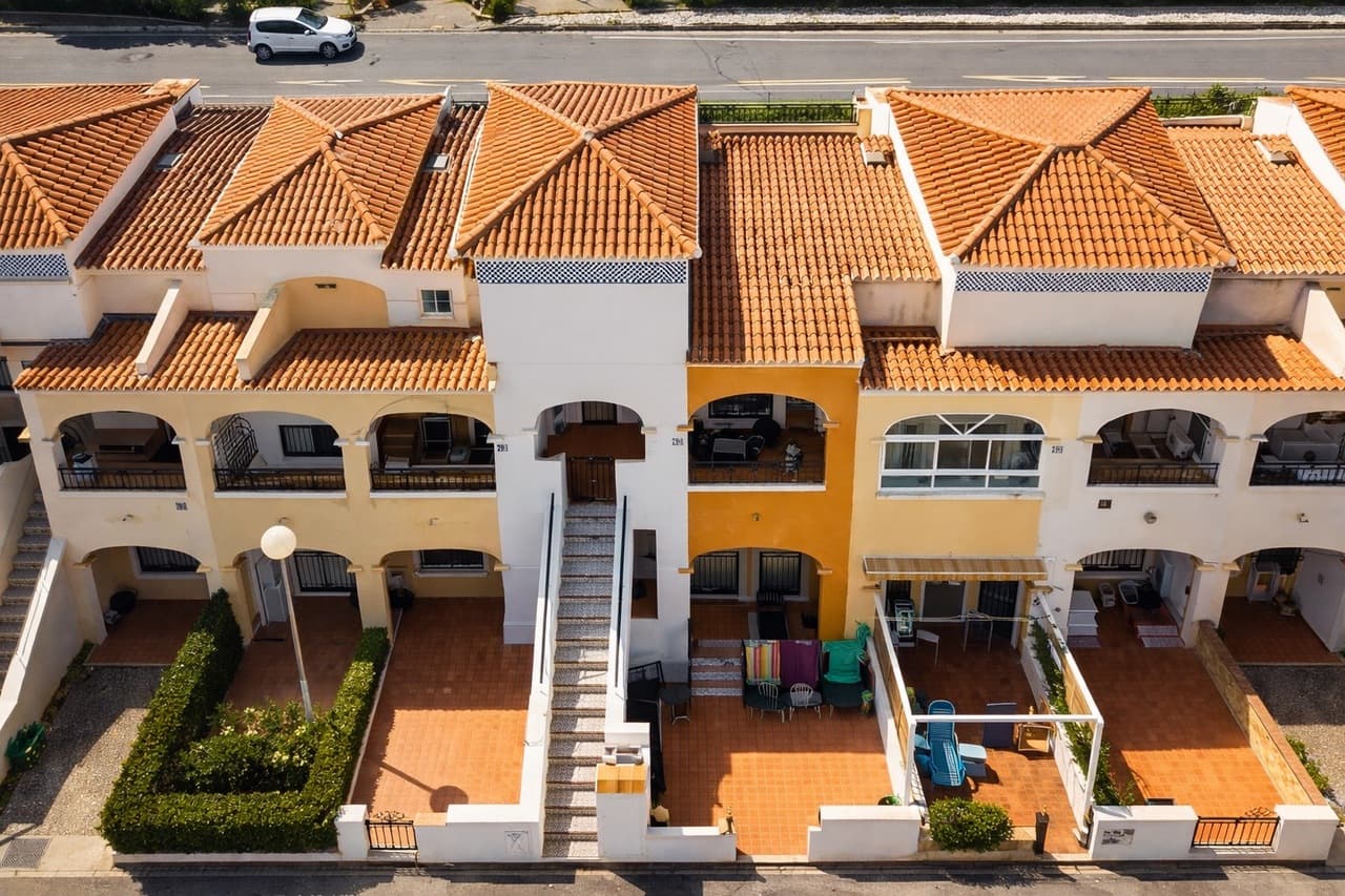 Discover this charming top-floor 2-bedroom apartment located in the highly sought-after area of Dream Hills, offering a wonderful combination of comfort, outdoor living, and beautiful views.As you enter the property, you are welcomed by a bright and inviting living room with direct access to the front terrace, the perfect spot to enjoy your morning coffee or relax in the Mediterranean sunshine. From here you also have access to the private rooftop solarium, one of the standout features of this home, where you can enjoy stunning panoramic views over the nearby salt lakes and surrounding mountains.The apartment offers a separate kitchen, providing a practical layout for everyday living. There are two well-sized bedrooms, both with fitted wardrobes, along with a family bathroom.The private solarium provides generous outdoor space ideal for sunbathing, entertaining guests, or enjoying the spectacular views and sunsets.Residents of the community also benefit from excellent shared facilities including a large communal swimming pool, outdoor gym, and paddle court, making it an ideal property for both relaxation and an active lifestyle.Located close to shops, restaurants, and local amenities, and just a short drive to the beaches of Orihuela Costa, this property is perfect as a holiday home, rental investment, or permanent residence.