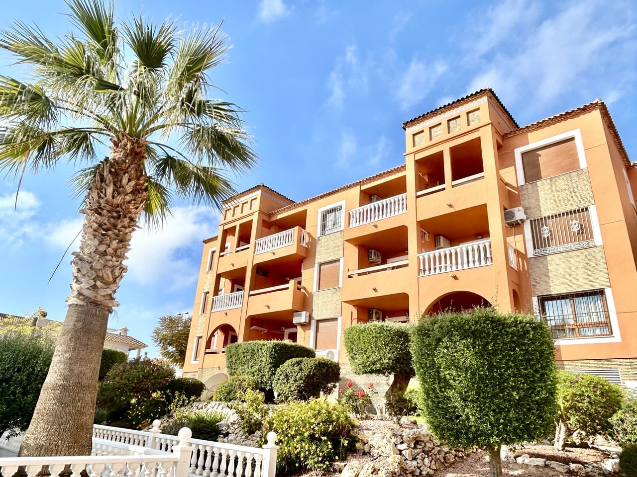 Set within the popular Pau 8 area of Villamartín, this spacious ground-floor apartment offers the perfect blend of comfort, convenience, and outdoor living—just a short walk from the lively Villamartín Plaza and a wide selection of bars, restaurants, and everyday amenities.The property features two generous bedrooms and a well-appointed bathroom, making it an ideal choice for both holidaymakers and full-time residents. Inside, the layout is bright and practical, with a welcoming living and dining area that opens directly onto a large private balcony—perfect for relaxing or entertaining while enjoying views over the beautifully maintained communal gardens.The outdoor space is a real highlight, offering a green outlook that enhances the sense of space and tranquillity. Residents also benefit from access to a lovely communal swimming pool, ideal for cooling off during the warm Mediterranean months.Adding to the appeal, the apartment includes its own private parking space in the underground garage, as well as a separate storage room—providing valuable extra space and convenience.With its excellent location, generous proportions, and attractive communal areas, this property presents a fantastic opportunity to enjoy the best of Villamartín living.