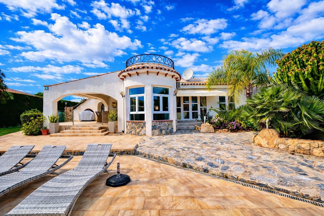 Introducing this exceptional fully renovated 6-bedroom, 4-bathroom detached villa, perfectly combining modern luxury with charming original character. Set on a generous 1,300 m² private plot with a constructed area of 344 m², this impressive single-level home is located in the peaceful and highly desirable area of Lomas de Cabo Roig, offering privacy while remaining within walking distance of restaurants, bars, cafés, and a supermarket. The beautiful beaches of Campoamor and Cabo Roig, as well as two renowned golf courses, are also just a short drive away.A spacious covered terrace welcomes you into the heart of the home, where an expansive open-plan living, dining, and kitchen area creates a bright and inviting space filled with natural light. The renovated kitchen is finished to a high standard and fully equipped with premium appliances including an American-style fridge freezer and double oven, making it ideal for both everyday living and entertaining.The property offers six versatile bedrooms, designed to adapt to a variety of needs. One en-suite bedroom is accessed directly from the main living area and is currently used as a stylish sports lounge. Along the main hallway you will find three additional bedrooms with fitted wardrobes and French doors, one of which is presently used as a home office. The final two spacious bedrooms overlook the pool and gardens and share a luxurious bathroom featuring a walk-in shower and freestanding bathtub, creating a relaxing retreat within the home.Outside, the villa truly shines as an entertainer’s paradise. The beautifully landscaped rear garden features a large private swimming pool and a stunning stone-built gazebo complete with a bar area, glass windows, TV, and a generous awning for shaded relaxation. The mature gardens are designed to be attractive yet low maintenance, while the entire property is enclosed by a solid perimeter wall, ensuring excellent privacy and security.This impressive property also offers excellent flexibility, with the possibility to easily create a separate two-bedroom guest apartment with its own lounge and kitchen/utility area, thanks to convenient external access—ideal for guests, extended family, or rental potential.Additional features include independent air-conditioning in all rooms, a fireplace in the main lounge a double garage, alarm system, and two outdoor storage rooms, making this a highly functional and comfortable home all year round.This is a rare opportunity to own a beautifully upgraded, spacious villa in one of the Costa Blanca’s most sought-after residential locations, perfectly suited for luxurious family living or as a high-end holiday retreat.