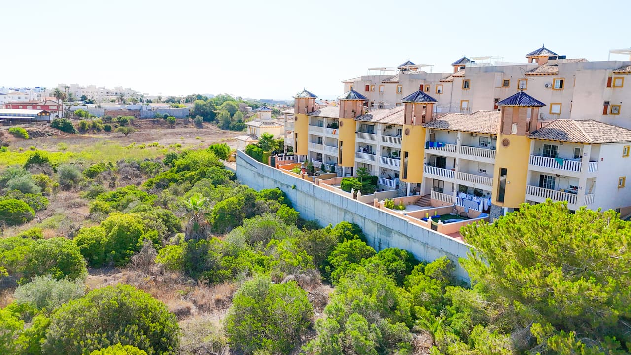 This lovely ground-floor corner apartment, perfectly located in a quiet and maintained urbanisation in Lomas de Cabo Roig. Offering a great blend of comfort, convenience, and value, this property is ideal for families, a holiday home, or an investment opportunity.The apartment features 2 bedrooms, a bright and spacious living area, and access to a communal pool — perfect for relaxing or enjoying time with family and friends. Additional benefits include off-road parking and close proximity to local amenities, restaurants, and beaches.Don’t miss the chance to own this charming home in one of the Costa Blanca’s most sought-after areas!