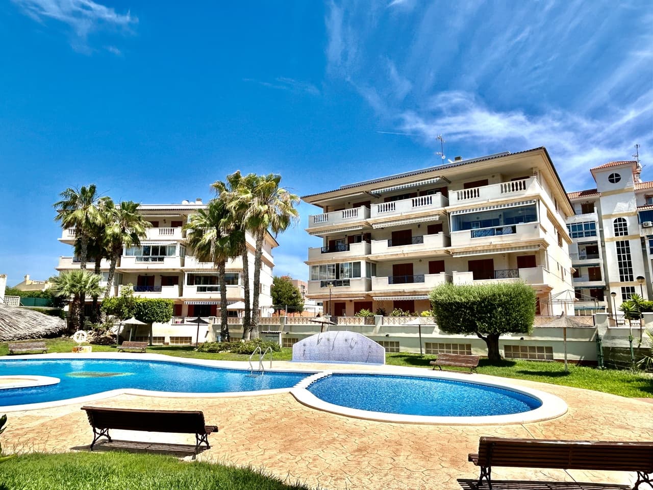 Discover the perfect coastal retreat in the heart of La Mata. This spacious 2-bedroom, 2-bathroom apartment offers an unbeatable location just a few meters from the golden sandy beach, with an excellent selection of shops, bars, cafés, and restaurants all within easy walking distance.Designed for comfort and relaxation, the apartment features bright and airy living spaces, generously sized bedrooms, and beautiful views overlooking the impeccably maintained communal pool and lush surrounding gardens. Whether you're enjoying your morning coffee on the terrace or unwinding after a day at the beach, the peaceful outlook creates the perfect Mediterranean atmosphere.Ideal as a holiday home, permanent residence, or investment opportunity, this property combines convenience, comfort, and coastal charm in one of the Costa Blanca’s most sought-after seaside locations.