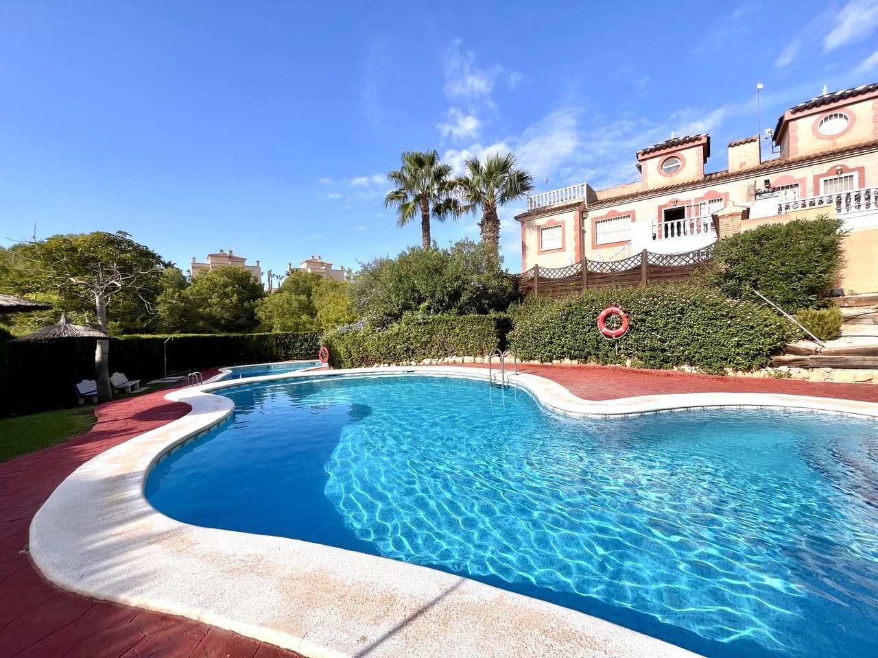 An amazing opportunity to own your very own 2-bedroom, 1-bathroom ground floor apartment in the sought-after area of Playa Flamenca, Flamingo Hills III.This property offers a bright open-plan living room with an American style kitchen, two spacious bedrooms, and a large family bathroom. Additional features include private storage, a driveway for easy parking, a generous back garden, and a charming front terrace perfect for enjoying the morning sunshine.Ideally located within walking distance to all amenities, the popular Saturday market is just a short stroll away, and shopping enthusiasts will love being only a 10-minute walk from La Zenia Boulevard.Residents can also enjoy two unique communal swimming pools, providing the perfect place to relax and soak up the sun.This area is in high demand, don’t miss out on this fantastic opportunity!