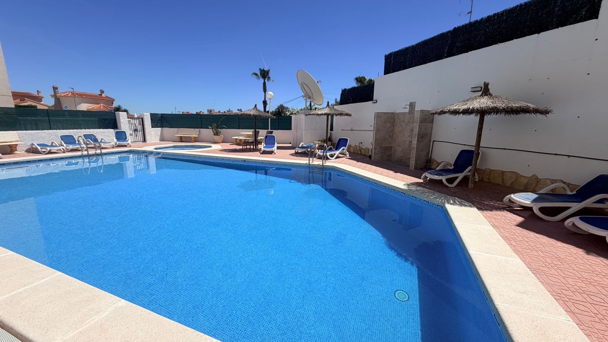 Looking to Buy a Property in Spain? Discover This Move-In Ready Apartment on the Costa BlancaAre you searching for a stylish apartment in Spain in a prime location on the sunny Costa Blanca? Then this beautiful ground floor apartment in La Marquesa – Quesada could be exactly what you are looking for. Located close to the golf course, lively bars, restaurants, and supermarkets, this property perfectly combines comfort, location, and Mediterranean lifestyle.Move-In Ready Apartment with Sunny Orientation and Beautiful ViewsThis well-maintained ground floor apartment features:2 spacious bedrooms1 renovated bathroom with modern walk-in showerOpen-plan kitchen with practical layoutBright and comfortable living roomCentrally positioned air conditioning for optimal comfortLarge terrace and tiled garden areaPrivate parking space on the plotConvenient storage room underneath the propertySouth-east orientation for excellent sunlight throughout the dayThe property has recently been refreshed with a new coat of paint and is presented in excellent condition. Thanks to its elevated position, you can also enjoy beautiful open views, making this home ideal as a permanent residence, holiday property, or investment opportunity.Prime Location Near Golf, Restaurants, and AmenitiesSituated in the highly sought-after La Marquesa Golf area in Ciudad Quesada, this apartment is especially popular among international buyers looking for a property in Spain near the sea with easy access to all amenities.Within walking distance or a short drive, you will find:The renowned La Marquesa Golf CourseCozy bars and international restaurantsSupermarkets and local shopsWalking and cycling routesThe sandy beaches of Guardamar del Segura just minutes awayA lovely communal swimming pool located further down the street adds even more charm and relaxation to this wonderful Spanish home.Why Invest in Property on the Costa Blanca?The Costa Blanca remains one of the most desirable regions for anyone considering buying a property in Spain. With its excellent climate, modern infrastructure, and vibrant international community, it is the perfect destination for both personal use and rental investment.This apartment offers:✔ Excellent investment potential✔ Low maintenance costs✔ Strong rental opportunities✔ Perfect as a holiday home or permanent residence✔ Great location close to golf courses and beachesWhile many buyers initially search for a Costa Blanca villa or new build property in Spain, more and more people are choosing quality apartments like this due to their practicality, easy maintenance, and outstanding value for money.