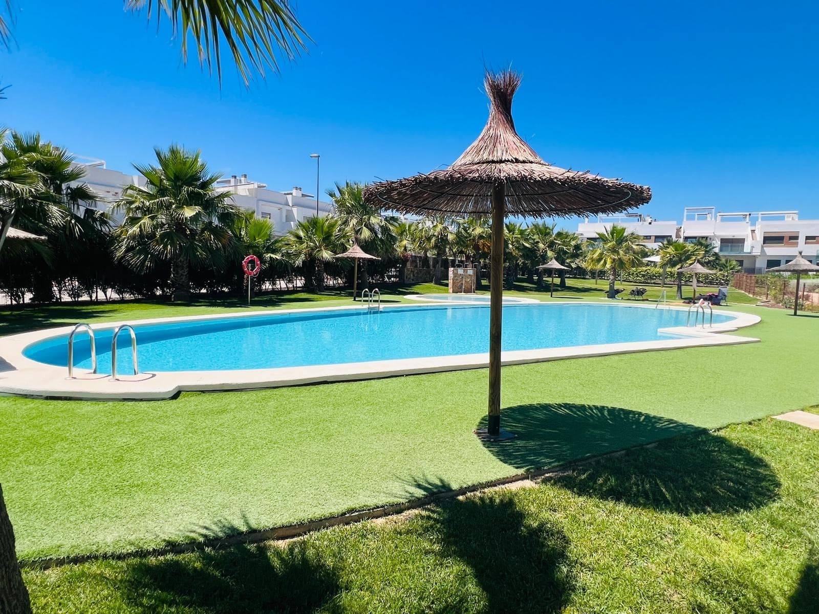 Modern Apartment for Sale in Spain on the Costa BlancaAre you looking for a stylish and move-in-ready apartment in Spain where comfort, tranquility and quality come together perfectly? This beautiful ground floor apartment in the highly sought-after Vistabella Golf on the Costa Blanca offers everything international buyers from Belgium and the Netherlands are searching for when looking to buy property in Spain.Located in a well-maintained residential complex with a communal swimming pool and landscaped gardens, this property combines an excellent location with modern living comfort. Thanks to the two spacious terraces, private parking space and practical storage room, this apartment is ideal as a permanent residence, holiday home or rental investment.Layout and Main Features of the ApartmentThis modern ground floor apartment offers:2 spacious bedrooms2 fully equipped bathroomsModern open-plan kitchenBright living area with direct terrace accessEast-facing terrace for sunny breakfastsWest-facing terrace and garden with evening sunPrivate parking space on the plotStorage room suitable for 2 bicyclesDirect access to the communal pool and gardensThe property has been designed with a strong focus on comfort, natural light and practical living. The open kitchen flows seamlessly into the living area, creating a modern and welcoming atmosphere.Dual Terraces with Sunlight and PrivacyOne of the standout features of this property is undoubtedly its exceptional outdoor space.East-Facing TerraceEnjoy the morning sunshine in complete peace and privacy — the perfect setting for breakfast or a coffee in the wonderful Spanish climate.West-Facing Garden and TerraceAt the rear of the property, you will find a cozy garden and terrace area with natural privacy created by mature greenery. If desired, the vegetation can easily be trimmed to open up beautiful views over the communal swimming pool and landscaped gardens.This unique combination of privacy and flexibility makes the apartment especially attractive for families, holidaymakers and investors alike.Living in Vistabella Golf – Costa Blanca SouthVistabella Golf has become one of the most desirable residential locations on the Costa Blanca South. The area offers the perfect blend of tranquility, nature, sports and everyday amenities.Nearby you will find:Golf coursesRestaurants and charming terracesShops and supermarketsWalking and cycling routesThe beautiful beaches of the Costa BlancaAlicante AirportThis is an international and vibrant area where you can enjoy more than 300 days of sunshine per year.Excellent Investment Opportunity in Spanish Real EstateMore and more international buyers are choosing real estate in Spain as a second home or property investment. This apartment offers excellent rental potential thanks to:Its sought-after locationProximity to golf courses and beachesModern finishesCommunal swimming poolFunctional and comfortable layoutWhether you are looking for an apartment in Spain, a holiday property or a high-potential investment, this home offers exceptional value on the Costa Blanca.