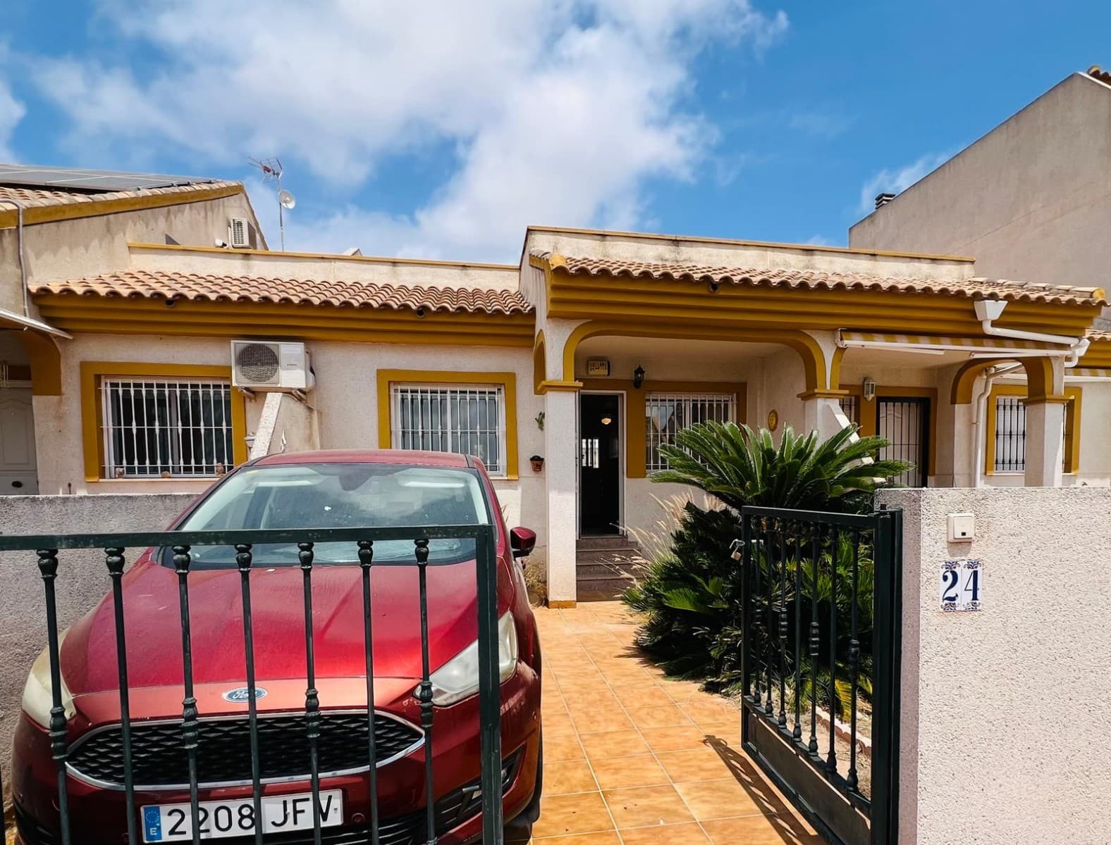 Nestled on the peaceful edge of the charming village of Daya Nueva, this beautifully presented townhouse offers the perfect blend of village living and tranquil countryside surroundings. With uninterrupted open views across the picturesque landscape, this inviting home provides a wonderful opportunity to enjoy the relaxed Mediterranean lifestyle.Approaching the property, you are welcomed by a private driveway providing convenient off-road parking, along with a lovely covered front terrace—an ideal spot to enjoy your morning coffee while taking in the peaceful atmosphere and sunshine.Inside, the accommodation is bright, comfortable, and thoughtfully arranged. The spacious living and dining area creates a warm and welcoming heart of the home, seamlessly connecting to the American-style kitchen, which is both practical and sociable, perfect for everyday living or entertaining family and friends.The property offers two generous double bedrooms, each featuring built-in wardrobes and air conditioning for comfort throughout the seasons. A well-appointed family bathroom serves the accommodation.To the rear, a private terrace provides additional outdoor living space and includes a covered utility and laundry area. From here, stairs lead to an impressive full-size rooftop solarium, where you can enjoy all-day sunshine thanks to the property's sought-after south-facing orientation. Whether you are sunbathing, dining al fresco, entertaining guests, or simply admiring the beautiful countryside views, this versatile outdoor space is sure to become a favourite feature of the home.Additional benefits include air conditioning in the living room and both bedrooms, ensuring comfort year-round. The property is offered fully furnished and includes all kitchen electrical appliances, allowing the new owners to move straight in and start enjoying everything this delightful home has to offer. There is a lovely community swimming pool only a few steps from the house, perfect for freshening up when it gets warm.Whether you are searching for a permanent residence, a lock-up-and-leave holiday retreat, or an attractive investment opportunity, this charming townhouse combines comfort, convenience, and stunning surroundings in one appealing package.