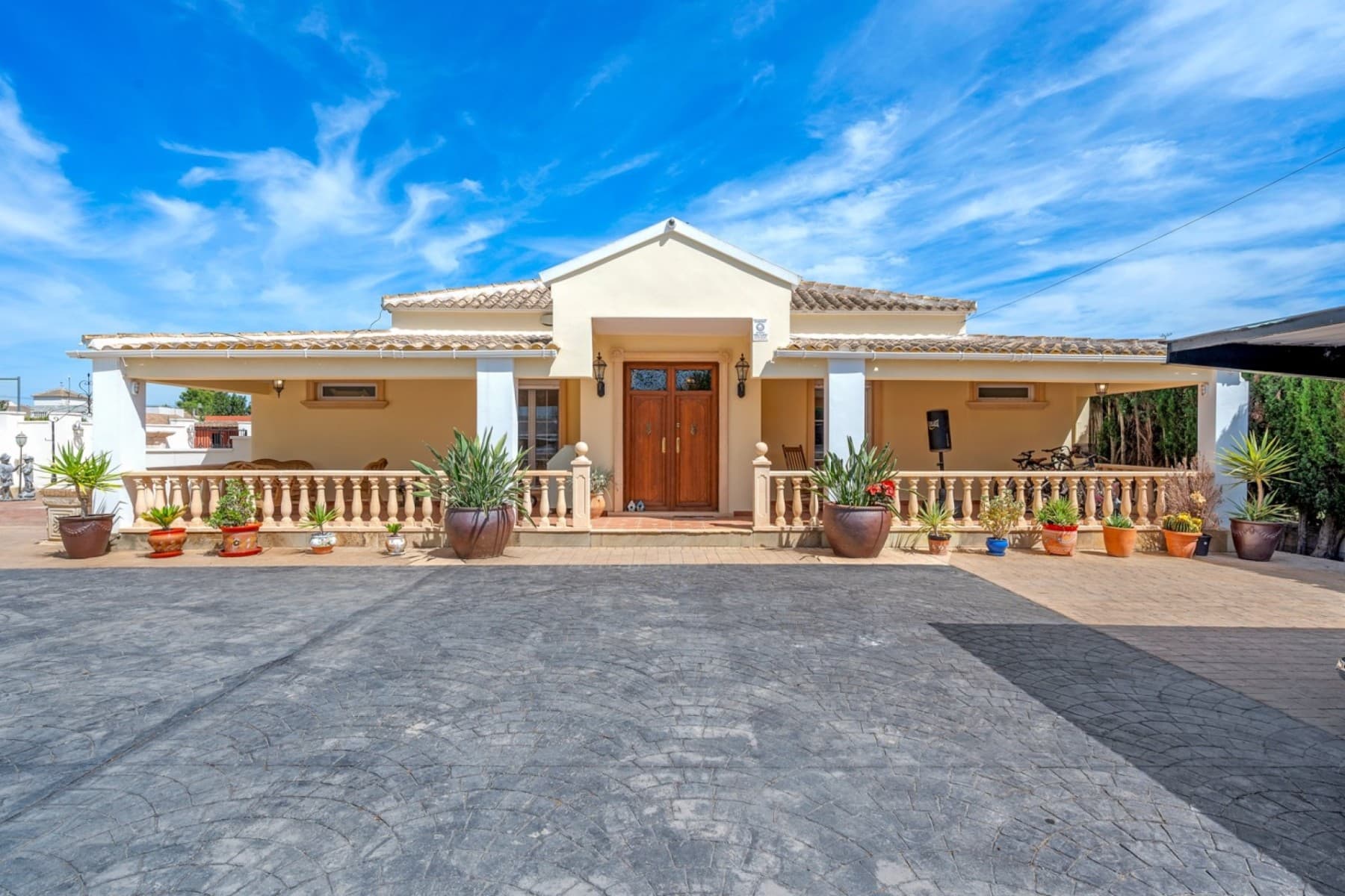 Luxury Country Villa with Stables for Sale in Heredades – Costa Blanca SouthThis impressive detached villa with private pool, stables and paddock is set on a generous 2,200 m² plot in the charming village of Heredades, between Formentera del Segura and Almoradí. Offering spacious interiors, guest accommodation, and extensive outdoor living, it is a unique opportunity in this sought-after part of the Costa Blanca South.The main villa features four bedrooms and three bathrooms plus a cloakroom. The master suite has a walk-in wardrobe and a luxurious en-suite with both bath and shower. Two additional bedrooms also benefit from en-suite bathrooms, while a fourth room is currently fitted as a golf simulator but could easily serve as another bedroom. A large kitchen with dining area opens directly onto the terrace, enjoying views across the gardens and pool.Further highlights include a living room with integrated office space, a utility room, fitted wardrobes, air conditioning and heating panels. The property also offers independent guest accommodation with two bedrooms, bathroom, kitchen and living space – perfect for visiting family or potential rental.Outside, a private swimming pool with tiled terraces is complemented by a summer kitchen, BBQ, covered seating areas, mature gardens and a carport. Equestrian facilities include three stables, a tack room and a paddock, offering a rare lifestyle opportunity.Heredades is a traditional Spanish village with amenities close by, while Formentera del Segura, Rojales, Benijófar and Ciudad Quesada provide shopping, restaurants, golf and leisure options within minutes. The beaches of Guardamar del Segura can be reached in 15 minutes, and Alicante Airport is just 35 minutes away.This villa combines modern comfort with countryside charm and is ideal as a permanent residence, holiday retreat or investment property.