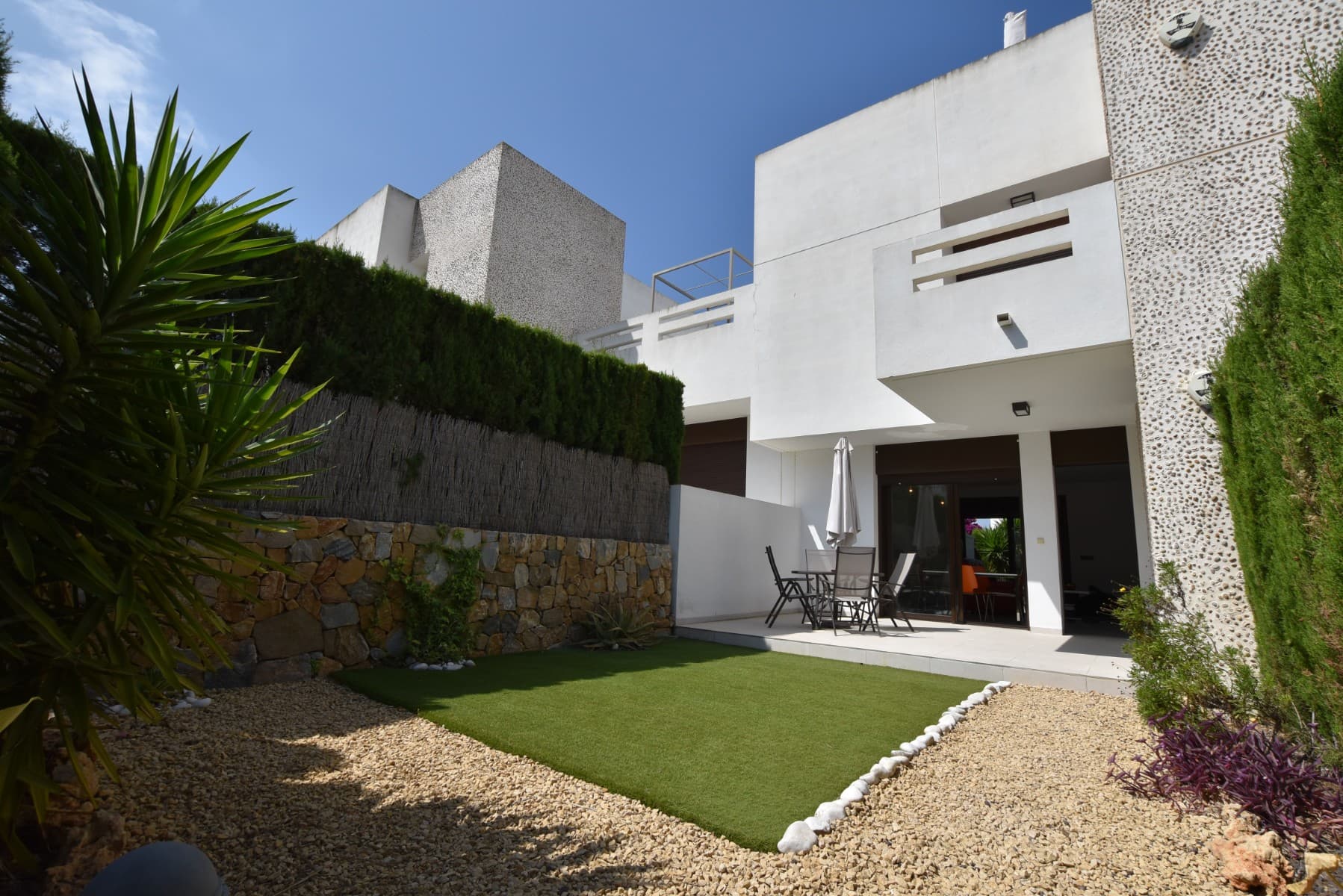 Modern Ground Floor Apartment in La Finca GolfLocated within the prestigious La Finca Golf Resort, Algorfa, this stylish ground floor apartment offers the perfect combination of contemporary design, comfort and Mediterranean living.The property features 2 bedrooms and 2 bathrooms, including a master bedroom with en-suite bathroom, making it ideal as a permanent residence, holiday home or investment property on the Costa Blanca.One of the standout features of this apartment is the abundance of natural light. Large windows and a modern layout allow sunlight to flood the living spaces throughout the day, creating a bright and welcoming atmosphere.The heart of the home is the spacious open-plan living and dining area with modern kitchen, designed to maximise both functionality and social living while creating a seamless connection between indoor and outdoor spaces.Outside, the property benefits from both a front garden and a rear garden, offering plenty of space to enjoy the Mediterranean climate, dine outdoors or simply relax in complete comfort.Situated within La Finca Golf, residents enjoy access to one of the Costa Blanca’s most sought-after resorts, featuring a championship golf course, spa hotel, restaurants, cafés and local amenities.Approximately 15 minutes from the beaches of Guardamar and 40 minutes from Alicante Airport.A fantastic opportunity for buyers seeking a bright, modern and low-maintenance property in a prime Costa Blanca location.