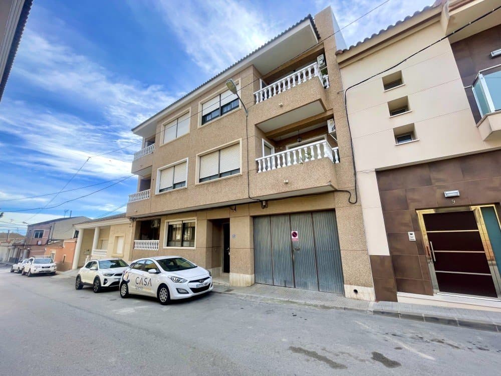 wp:paragraph We are delighted to present this beautifully refurbished ground-floor apartment located in Torremendo, Orihuela, a charming and peaceful village with local shops and few minutes walking from the Public Pool.The property is situated on the ground floor, with no need for a lift, and has been fully renovated, ready to move into. It offers bright and spacious living areas, including a large and luminous living room, a dedicated dining area with a generous table and chairs, and a large window providing access to a balcony, perfect for enjoying daily meals.The separate kitchen is brand new and fully equipped, and benefits from a spacious utility/laundry room, ideal for storage as well as household tasks.The apartment features two large bedrooms, both with built-in wardrobes, a modern fully fitted bathroom, and an additional room currently used as an office, which can easily be adapted to other uses. There is also a large walk-in dressing room with a big window leading to a lovely terrace, ideal for outdoor dining with friends and family while enjoying the tranquillity of the area.From this space, there is access to a large independent studio, offering a wide range of possibilities: a gym, professional workspace (beauty salon, yoga studio, hairdresser, etc.), or it could be renovated and converted into a separate guest accommodation.All rooms are equipped with ceiling fans and electric radiators. The living room and master bedroom have air conditioning, while the bathroom and office are fitted with heaters.The property is sold furnished, excluding personal belongings and some appliances such as the washing machine and tumble dryer.A municipal swimming pool is located just a few metres from the building, and there is ample on-street parking available nearby.This is a unique opportunity to purchase a property where no work is required — simply bring your suitcases and start enjoying your new home. /wp:paragraph