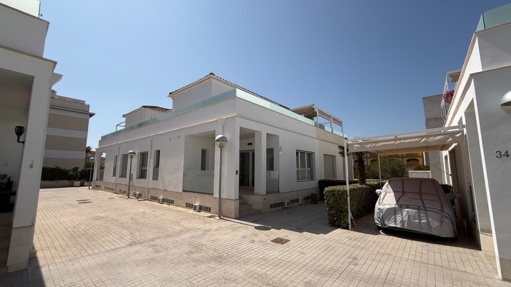 Modern Quad Villa in Los DolsesThis beautifully designed modern-style quad villa is a fantastic opportunity in the sought-after area of Los Dolses, Orihuela Costa. Just minutes away from all amenities, local restaurants, street markets, golf courses, and the beach, as well as the popular Zenia Boulevard Shopping Centre.The property is sold fully equipped and move-in ready, offering a generous layout with 5 bedrooms and 3 bathrooms spread over three levels:Ground floor: bright living room, fully fitted kitchen, one bedroom, and a bathroom.Basement level: spacious second living area with natural light, two bedrooms, and a full bathroom – perfect for guests or extended family.First floor: two more bedrooms, a bathroom, and a large balcony terrace ideal for relaxing or entertaining.Additional features include LED lighting throughout, private parking space, and access to a communal swimming pool.