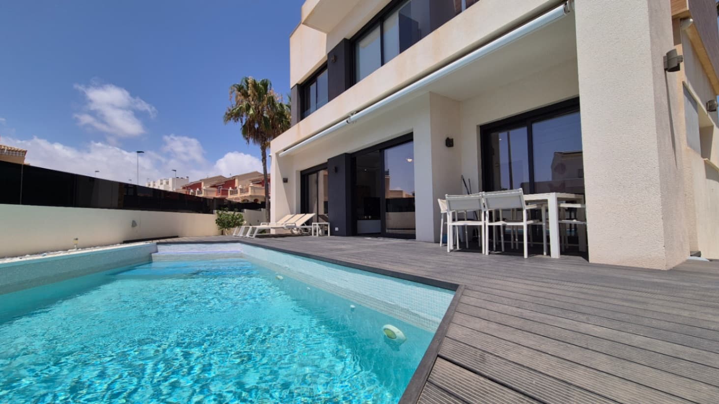 Inviting Detached House in TorreviejaWelcome to this beautiful detached house situated in the charming Torrevieja area of Costa Blanca Sur, Alicante. This stunning property invites you to experience a comfortable lifestyle, characterized by its spacious layout and exceptional outdoor features.Spacious LayoutThis residence boasts four generously sized bedrooms and four well-appointed bathrooms, ensuring ample space for family and guests alike. With a built area of 205 square meters, every corner of this home is thoughtfully designed to maximize comfort and functionality.Outdoor OasisEnjoy the splendid Mediterranean climate from your private terrace, providing the perfect space for relaxation or entertainment. The 466 square meter plot includes a beautifully maintained garden, ideal for outdoor gatherings or simply lounging in the sun. A private pool adds a luxurious touch, ensuring you can indulge in summer days or serene evenings under the stars.Modern Living FeaturesThis house is furnished with contemporary comforts, including air conditioning to keep you cool during hot months, and double-glazed windows that enhance energy efficiency and tranquility. The open American kitchen merges style and practicality, making it a delightful space for cooking and entertaining. Additional amenities such as a covered terrace and barbecue area create an inviting atmosphere for outdoor dining.Prime OrientationPositioned with a southwest orientation, this home captures plenty of natural light, creating a warm and welcoming ambiance throughout the day. Whether you are enjoying a morning coffee or soaking up the evening sun, the orientation enhances the living experience.Convenient Parking and AccessibilityThe property includes dedicated parking, providing convenience for homeowners and guests. Its location in Torrevieja allows easy access to local amenities, picturesque beaches, and vibrant cultural experiences, making it an ideal spot for both permanent residents and vacationers.Energy EfficientWith an energy certification rating of B, this property stands out not only for its stunning features but also for its commitment to sustainability, offering a modern living option that is considerate of environmental impacts.This detached house in Costa Blanca Sur embodies the essence of coastal living, merging comfort, style, and convenience in one exceptional package. Embrace the opportunity to make this your dream home.