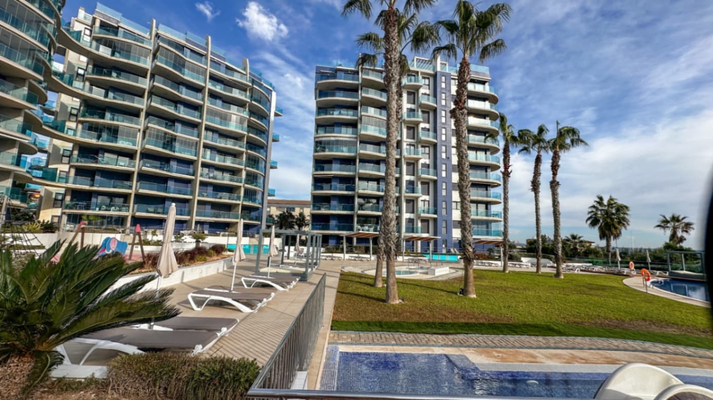 Elegant Two-Bedroom Apartment in TorreviejaNestled in the heart of the prestigious Costa Blanca Sur region in Alicante, this meticulously designed two-bedroom apartment offers a sophisticated living experience in Torrevieja. Perfectly suited for those seeking both comfort and style, this residence epitomizes modern coastal living.Expansive Living SpaceBoasting a generous 93 m² of living space, this apartment provides an open-plan layout that effortlessly integrates indoor and outdoor living. The design prioritizes natural light, creating bright, airy interiors that foster a welcoming and tranquil ambiance, ideal for both relaxation and entertaining.Fully Equipped American KitchenAt the heart of the home is a contemporary American-style kitchen, complete with high-end appliances and ample counter space. Whether preparing meals for guests or enjoying quiet dinners, this functional and stylish kitchen allows for seamless interaction with the adjoining living areas.Luxurious BedroomsThe apartment features two well-appointed bedrooms, each offering a serene and private retreat. Thoughtful design and ample storage ensure these spaces are both practical and restful, providing an ideal environment for relaxation.Sophisticated BathroomsThis property includes two elegantly designed bathrooms, each equipped with modern fixtures and finishes. These spaces are crafted to provide comfort and convenience, offering a refreshing escape after a busy day.Charming Outdoor TerraceThe 15 m² terrace extends the living space, providing a perfect outdoor haven for enjoying the Mediterranean climate. Whether savoring your morning coffee or reading in the afternoon sun, the terrace offers an intimate setting to unwind and enjoy the surrounding beauty.Community AmenitiesResidents can take full advantage of the community’s premium amenities, including a spacious pool area ideal for relaxation and socializing. This communal space enhances the overall lifestyle experience, offering a perfect retreat on warm, sunny days.Prime LocationStrategically located, this apartment offers easy access to a range of local amenities, including shops, restaurants, and the beautiful sandy beaches of Torrevieja. The vibrant town center, with its lively markets and picturesque promenades, is within walking distance, providing an abundance of cultural and leisure options.Modern Comfort and ConvenienceFitted with air conditioning, this apartment ensures year-round comfort. Additional features include a private garage, and the property is sold fully furnished, allowing for a seamless move-in experience.