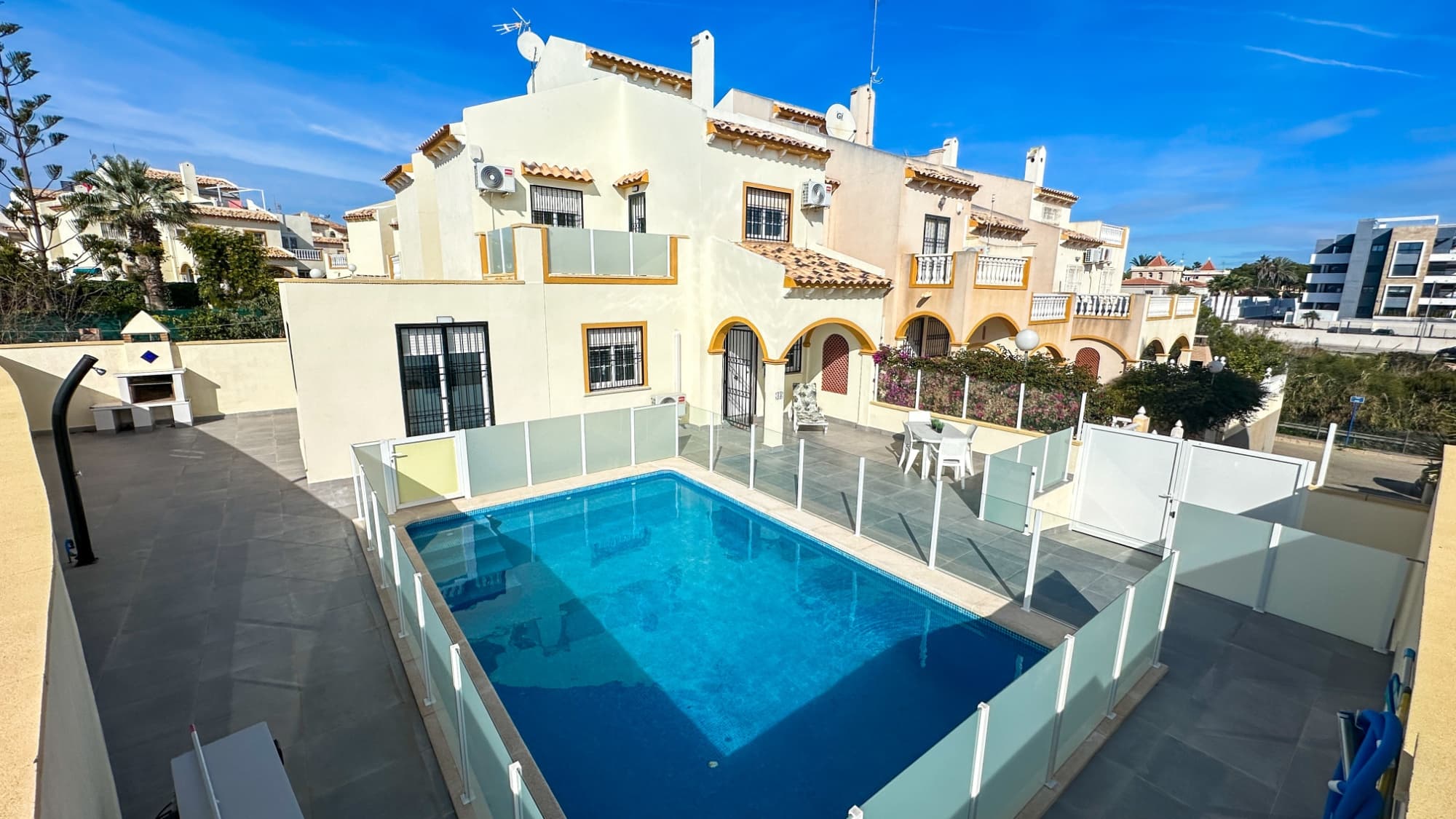 Discover this beautifully fully renovated corner house in La Zenia, ideally located just around the corner from the famous La Zenia Boulevard. Enjoy modern Mediterranean living in a home that combines style, comfort, and exceptional outdoor space.Originally designed with 3 bedrooms and 2 bathrooms, the property has been intelligently reconfigured into a spacious 2-bedroom, 2-bathroom layout, offering larger rooms, improved flow, and a more open, contemporary feel throughout.Step outside to your own private oasis: a heated swimming pool, perfect for year-round enjoyment, surrounded by a sunny terrace ideal for relaxing, dining, or entertaining. As a corner house, the property benefits from extra privacy, additional light, and generous outdoor areas.Inside, every detail has been updated—modern finishes, high-quality materials, and thoughtful design choices make this home truly move-in ready. Whether you’re seeking a permanent residence, a holiday retreat, or a high-yield rental investment, this renovated gem in the heart of La Zenia offers outstanding value and convenience.