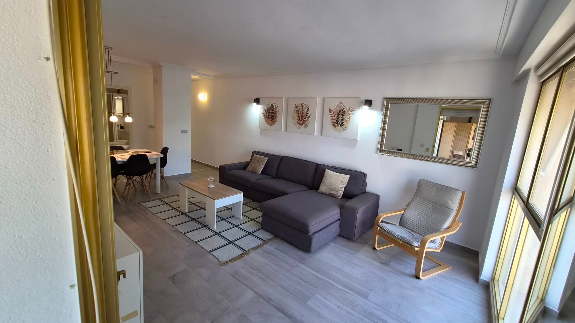 We present this spectacular, renovated apartment in the heart of Torrevieja, just steps from the new Paseo del Mar marina.The apartment features three bedrooms (one converted into a dressing room with built-in wardrobes and mirrors), a full bathroom, and a guest toilet.The separate kitchen is equipped with all new appliances, perfect for everyday living. From the kitchen, you can access a laundry room with a washer and dryer, a very practical feature as it doesn't take up any additional living space.The spacious living-dining room is bright and airy thanks to its southeast orientation.The master bedroom, with built-in wardrobes, opens onto a sunny covered terrace with direct views of the marina, promenade, and sea.The apartment is located in a prime area, close to the sea, leisure activities, restaurants, bus stops, banks, pharmacies, and more.Call us for more information!
