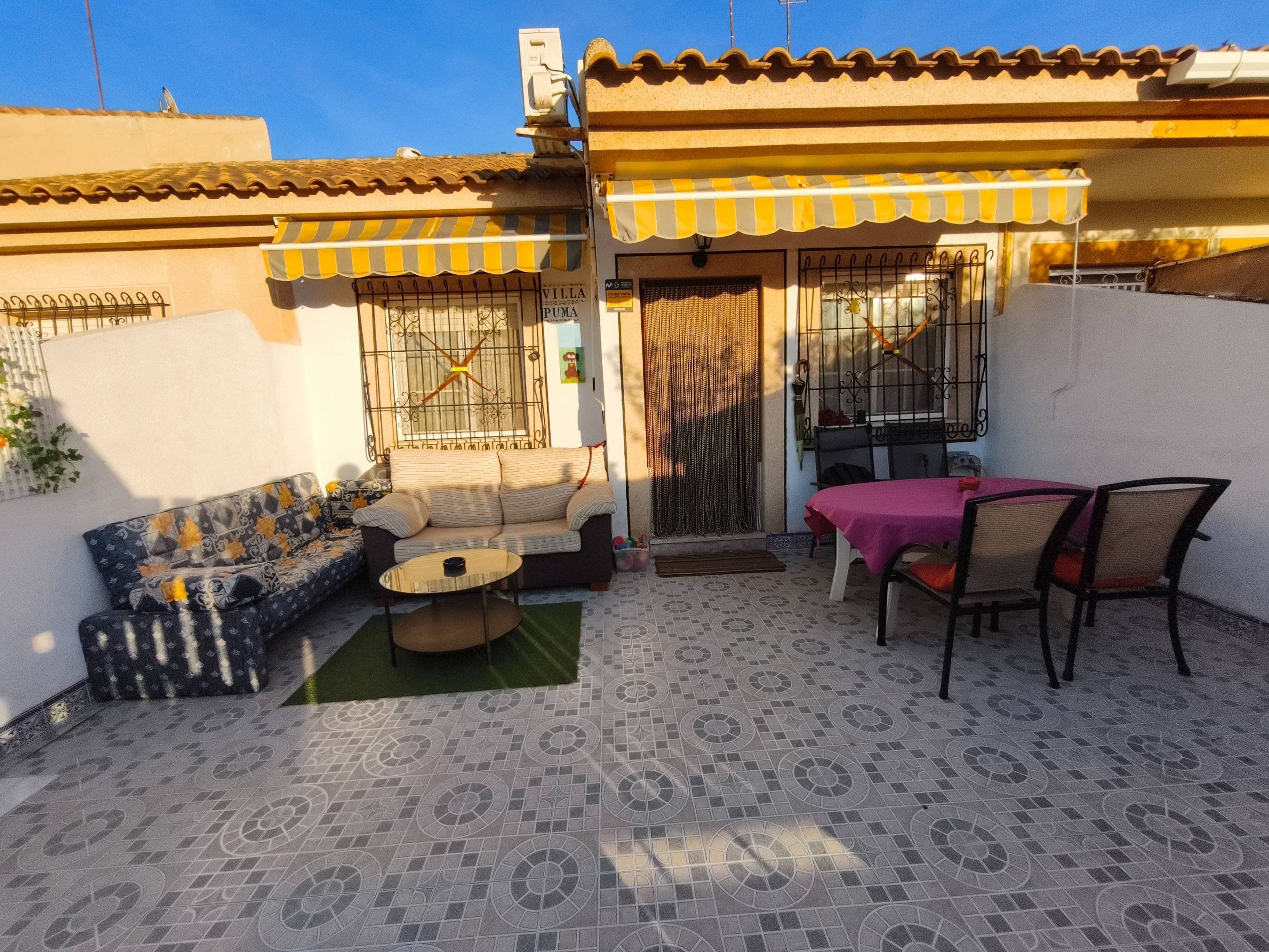 Discover this charming townhouse located in the quiet area of ​​Lo Pagan, within the coastal municipality of San Pedro del Pinatar. With an attractive price of €159,900, this property boasts a constructed area of ​​120 square meters and a usable area of ​​95 square meters. The property is in good condition and faces south, guaranteeing natural light throughout the day. Just 800 meters from the Mediterranean Sea, you can easily enjoy both beaches and water sports. The interior comprises two spacious double bedrooms plus a single bedroom, ideal for customizing to your needs; it also includes a full bathroom and two additional toilets for greater family or social comfort. Among its extras are: a welcoming terrace perfect for relaxing outdoors and stunning views of the surrounding area. The location also offers proximity to local shopping centers and well-regarded schools, ensuring quality education nearby; hospitals are available, guaranteeing effective medical care, along with safe children's play areas where your little ones can play without worry.