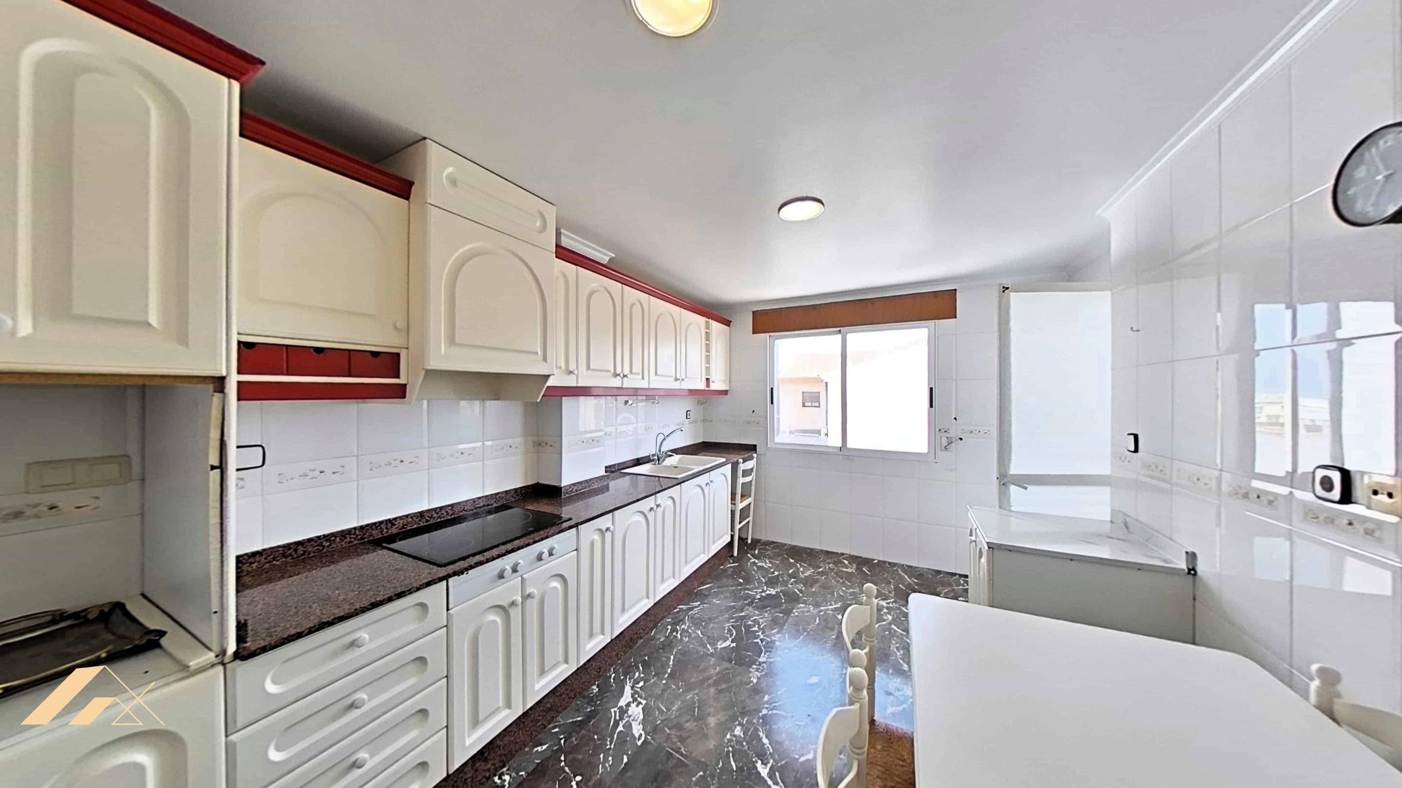 A RARE APARTMENT There are homes you can visit, and then there are homes that truly surprise you. This is one of the latter. In an era where new developments are increasingly smaller, finding an apartment of this size in the heart of Pilar de la Horadada is practically impossible. Located on the third floor of a building with an elevator, this spectacular apartment offers spaces reminiscent of grand buildings of yesteryear: spacious, bright rooms designed for truly enjoying home. It features four exterior bedrooms, a rarity these days. One of them also has direct access to the terrace, allowing you to enjoy natural light and the Mediterranean air from the moment you wake up. The heart of the home is its impressive living room, a spacious and welcoming space with direct access to a fantastic balcony-terrace where you can enjoy breakfast in the sun, family gatherings, or simply contemplate the life of the town center from a privileged vantage point. But if there's one room that truly captivates, it's the enormous independent kitchen of approximately 35 m². A space that has practically disappeared from the real estate market these days. Here, there's room to cook, eat, gather with family, and make it the true heart of the home. The property also features two full bathrooms, a parking space, and all the necessary amenities for comfortable living year-round. The location is simply unbeatable. Situated next to the Town Hall and just a few meters from Calle Mayor, you'll have supermarkets, cafes, shops, pharmacies, schools, banks, and all the services you need for daily life right at your doorstep. And when you feel like enjoying the sea, the magnificent beaches of Torre de la Horadada are only 10 minutes away...