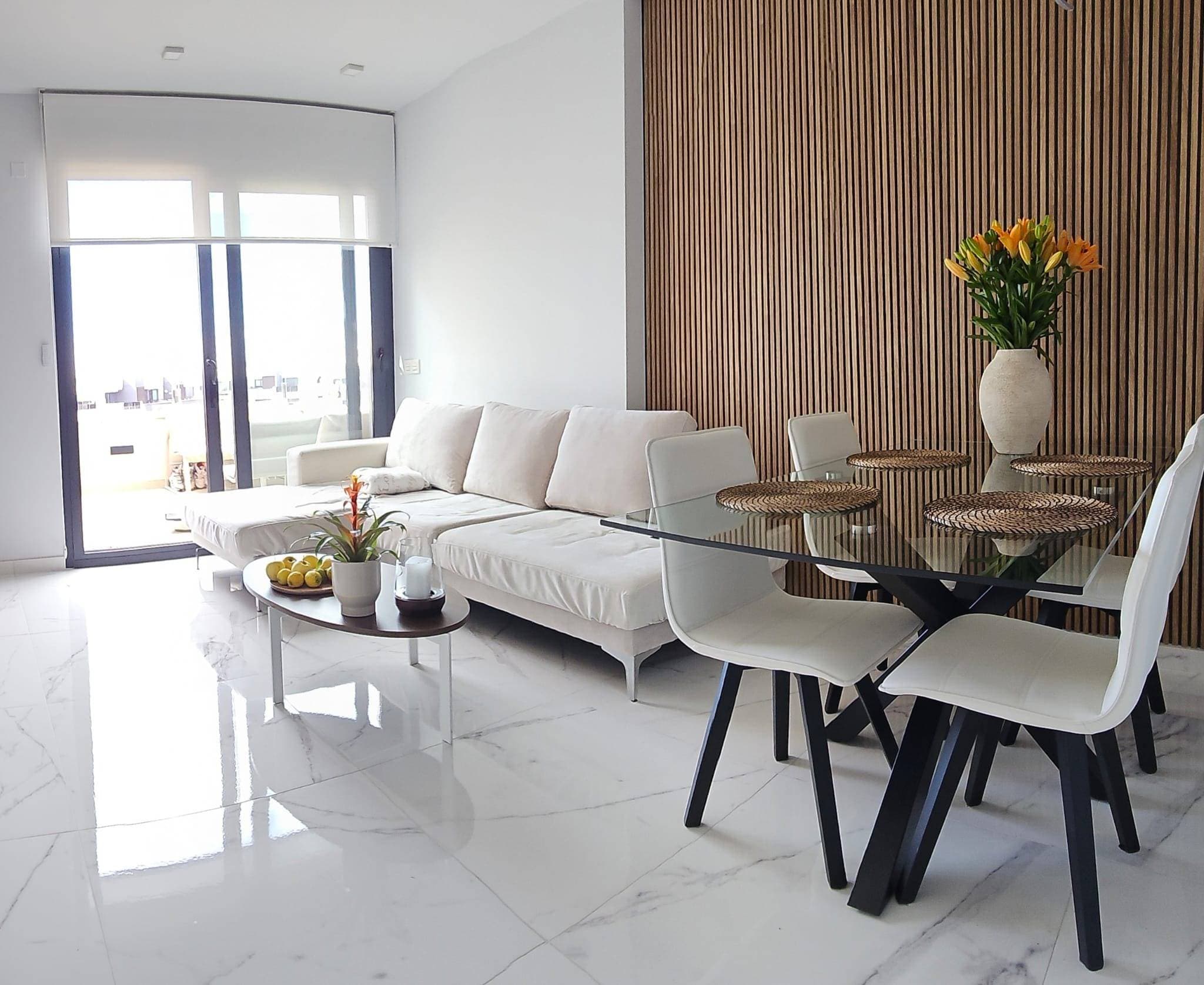 Discover this modern apartment in the sought-after Los Altos area of ​​Orihuela Costa. With a built area of ​​68 m² and a usable area of ​​60 m², this nearly new property offers a functional design that maximizes space. It features two double bedrooms, ideal for couples or small families, and two well-equipped full bathrooms. Its east-facing orientation allows you to enjoy the morning sun from its spacious private terrace. Located just 4,000 meters from the Mediterranean Sea, you'll have easy access to beautiful beaches while enjoying the tranquil atmosphere that characterizes the area. Furthermore, the complex boasts excellent amenities, including a communal swimming pool perfect for relaxing on hot days. This property also includes private parking and is surrounded by green areas with lush trees and children's play areas. Nearby bus stops make getting around easy, and the property also offers quick access to major shopping centers and local educational institutions, adding significant value to family life. Don't miss this unique opportunity! Come and see it today for only €283,000.