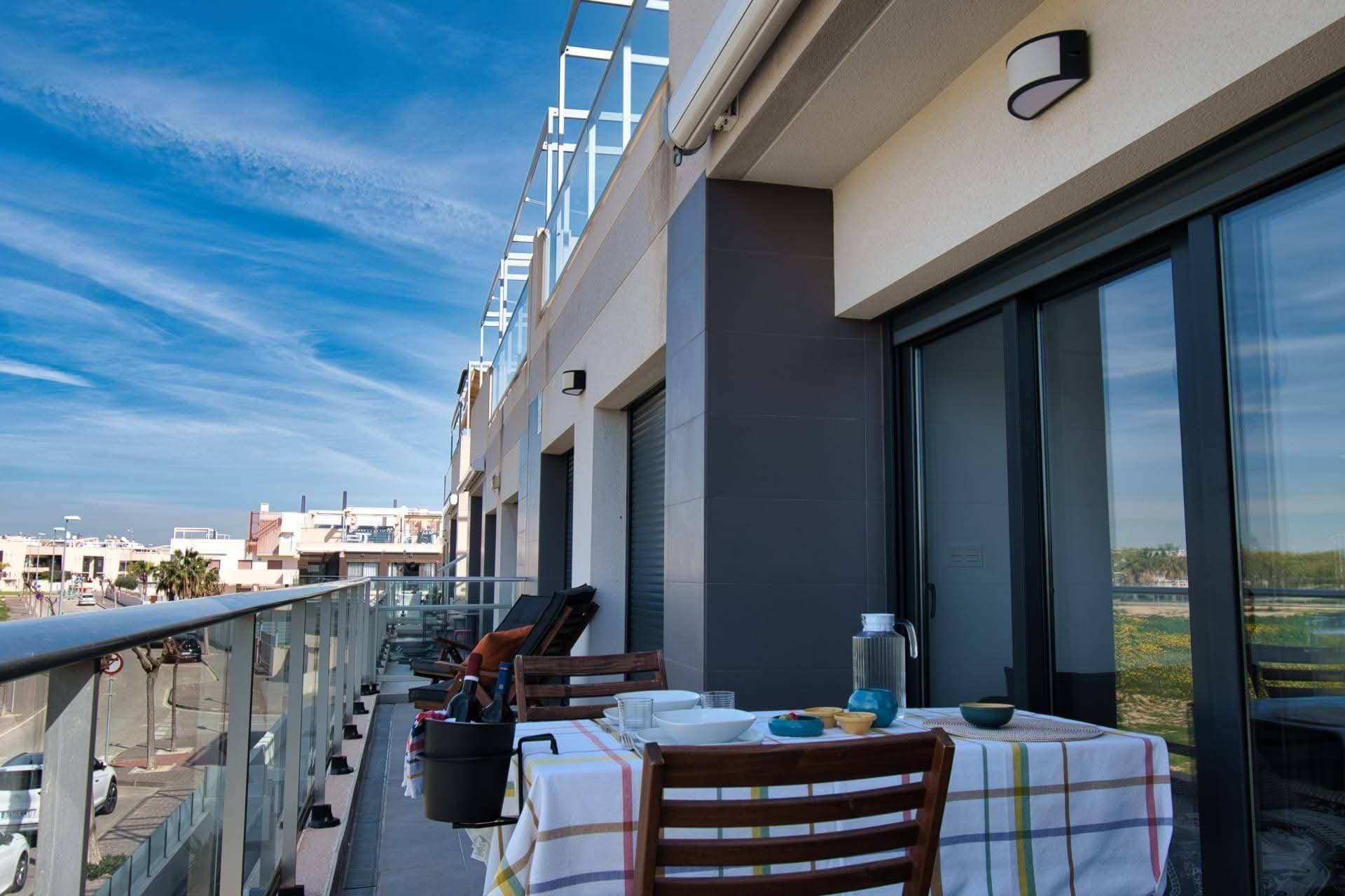 Discover this magnificent penthouse located in the charming Pueblo Latino neighborhood of Pilar de la Horadada. With a constructed area of ​​110 m² and a usable area of ​​60 m², this property is designed to offer comfort and style from the moment you step inside: it's ready to move into! The apartment features two spacious double bedrooms that provide a welcoming living space. It also has two full bathrooms that guarantee privacy and comfort. Among its outstanding features are a private parking space and a communal swimming pool, ideal for enjoying the warm Mediterranean climate year-round; as well as a large terrace where you can relax or share unique moments outdoors while enjoying views of the surrounding natural landscape. Located just 3,500 meters from the Mediterranean Sea, it offers easy access to beaches, shopping centers, schools, and hospitals, making it convenient for young families or those looking to settle near the hustle and bustle of the city without sacrificing daily peace and quiet. This property also offers green communal areas surrounded by lush trees, perfect for children's play areas, ensuring tranquility and security.