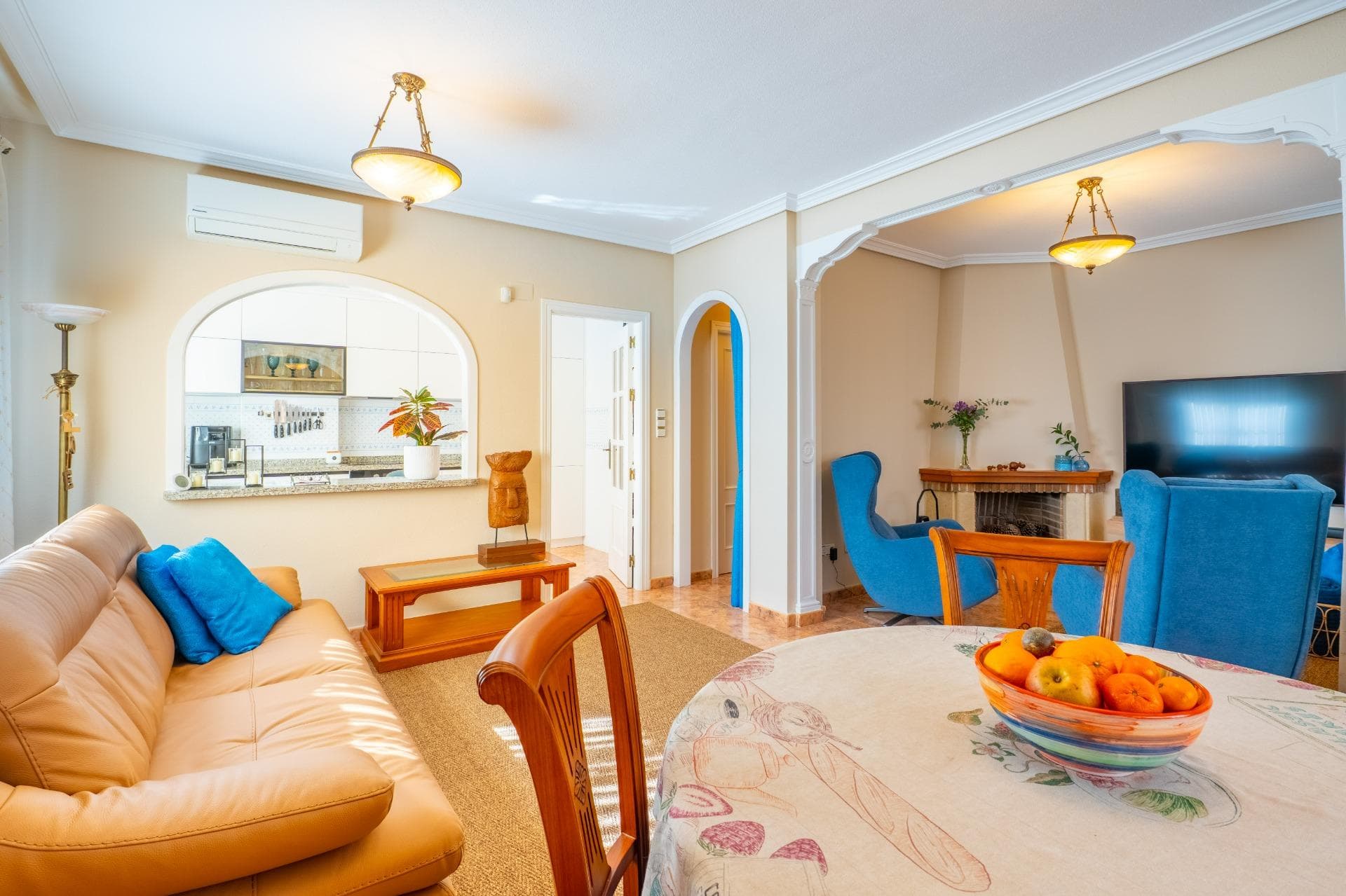 We invite you to visit this charming duplex house in Residencial Vista Azul, located in Orihuela Costa, one of the most sought-after areas of the Costa Blanca. Set in a highly regarded residential environment, it allows you to enjoy the Mediterranean climate with peace and quiet and an active, healthy lifestyle. The property offers a comfortable layout over two floors plus a solarium. It features a spacious and bright furnished living room with a fireplace, a modern fully equipped open-plan kitchen, 2 bedrooms, and 2 full bathrooms. It also includes a bright terrace with a relaxation area and a well-maintained garden with a chill-out space and on-plot parking. A private storage room is included. One standout feature of this villa is its solar panels. Everything included in the price!!!! Located within Residencial Vista Azul, the complex offers a communal swimming pool and landscaped gardens. It is approximately 1 km from the sea and 1.7 km from Centro Comercial La Zenia Boulevard, with all essential services nearby: supermarkets, restaurants, shops, and pharmacies. An ideal location thanks to its tranquility, beautiful beaches, and excellent climate — perfect both as a permanent residence and as an investment. The property price does not include notary fees, land registry fees, or applicable taxes, which vary depending on the property price and current regulations in the Comunidad Valenciana.