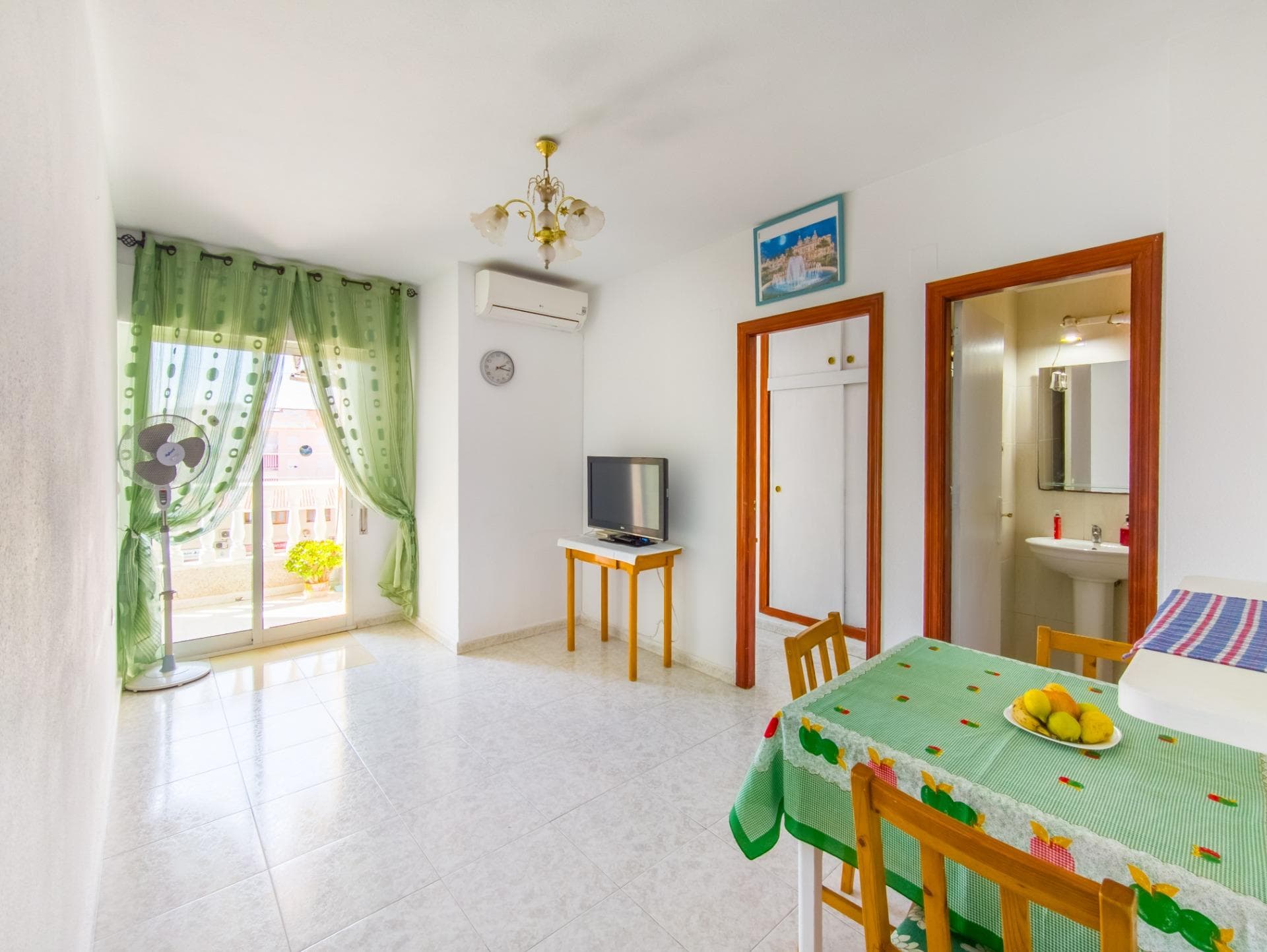 We present this bright apartment located in a central area of Torrevieja, a coastal city on the Costa Blanca. It is a tourist area known for its wide range of beaches and its sunny climate all year round. The apartment features an excellent layout: a bright, furnished living room integrated with the dining area, and a fully equipped independent kitchen with furniture and appliances. The living room has direct access to the terrace, providing plenty of natural light and warmth. It also offers 2 bedrooms with built-in wardrobes and 1 fully furnished bathroom. The property is located on the third floor, in a central area of Torrevieja. Its convenient location allows easy access to all kinds of services and leisure areas. Situated in the center of Torrevieja, in the coastal area, just 5 minutes from the beach. Ideal both for living and investment, offering the opportunity to enjoy the sun, the sea, and an excellent quality of life on the Costa Blanca South. Torrevieja is a coastal city in constant growth, ideal both as a holiday destination and for long-term living. In recent years, new schools, sports centers, infrastructures, and residential complexes have been developed. Additionally, it offers year-round beach tourism thanks to its pleasant and warm climate. Taxes (10%, reduced rates of 8% and 6%) Notary fees (approximately €800–€1300) Land Registry fees (approximately €300–€700) Administrative/consulting fees (approximately €900–€1500) NO ADDITIONAL REAL ESTATE AGENCY COMMISSION FEES