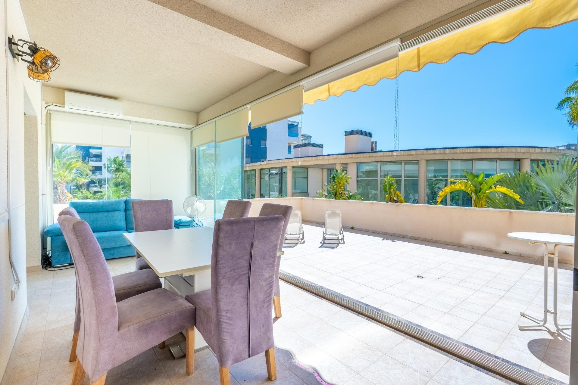 We present this modern apartment located in the exclusive Green Hills Residential, a luxurious recently built complex featuring a sauna, children's areas, a gym, and a swimming pool surrounded by spacious green areas. This is a resale new-build property in excellent condition, ready to move into. Located in the prestigious area of Orihuela Costa, one of the most sought-after locations, it is ideal for enjoying the Mediterranean climate, tranquility, and an active, healthy lifestyle. The property stands out for its comfortable and functional layout, as well as its great brightness. One of its main highlights is its spacious terrace, which features a glazed area with air conditioning and a relaxation space, perfect for year-round use, as well as an open outdoor area with excellent sunny orientation, ideal for sunbathing at any time of the year. The apartment includes a modern, fully furnished living room, a fully equipped designer kitchen in light tones, 3 bedrooms with built-in wardrobes, and 2 full bathrooms. In addition, it comes with a parking space, providing convenience and security for your vehicle. Located in a quiet and safe area, it offers excellent proximity to all kinds of services: shops, supermarkets, schools, and leisure areas. Just a few minutes away is Zenia Boulevard, the largest shopping center in the area. Nearby beaches such as La Zenia and Playa Flamenca are also major attractions. For leisure and sports, the proximity to Villamartín Golf, one of the most renowned golf courses in the area, stands out, along with other sports facilities. With more than 300 days of sunshine per year and a mild climate, this location allows you to enjoy outdoor activities all year round, such as seaside walks, water sports, golf, and an active social life. An ideal option as a permanent residence, holiday home, or investment on the Costa Blanca. Taxes (10%, reduced rates of 8% and 6%) Notary fees (approximately €800–€1300) Land Registry fees (approximately €300–€700) Administrative/consulting fees (approximately €900–€1500) NO ADDITIONAL REAL ESTATE AGENCY COMMISSION FEES