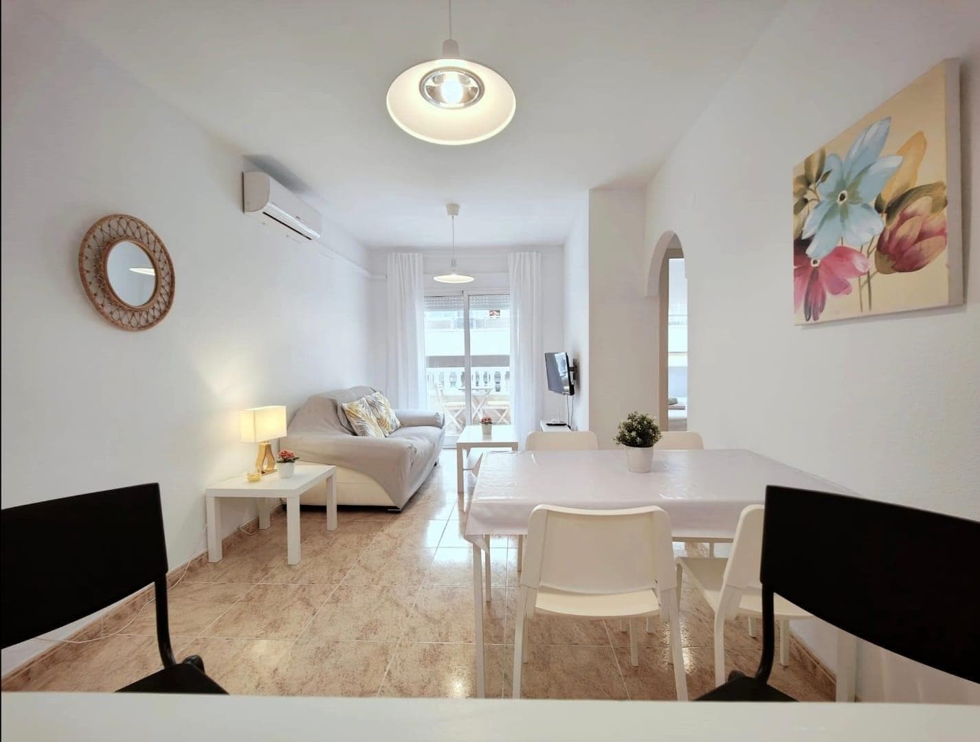 Living in the heart of Torrevieja means being part of a city that combines sea, light, and year-round vibrancy. This two-bedroom, one-bathroom apartment, with a swimming pool and sold furnished, represents an ideal opportunity for those seeking comfort, dynamism, and quality of life in a prime location. It's a home designed to enjoy both the urban environment and the moments of relaxation offered by its private space. The city center is the heart of the city. Here, everything happens: mornings begin with the coming and going of neighbors, the aroma of freshly brewed coffee, and shop shutters opening to the sun. Throughout the day, the streets maintain a steady, yet pleasant rhythm, where residents and visitors mingle in a friendly and welcoming atmosphere. Living in this area means having services, shops, restaurants, and meeting places just steps away. Torrevieja is known for its mild and sunny climate. The sun shines for much of the year, creating a warm atmosphere that directly influences mood and lifestyle. Strolling through the city center is to enjoy the Mediterranean clarity that enhances the colors and provides a constant sense of well-being. The proximity to the sea is palpable in the air, in the light breeze that cools the afternoons, and in the possibility of reaching the promenade in just a few minutes. This apartment offers the perfect balance between urban energy and inner tranquility. After an active day, returning home means disconnecting from the outside world and enjoying your own space to relax. The two-bedroom layout adapts to different stages and needs, offering versatility for small families, couples, or even those who need extra space to work remotely or entertain guests.