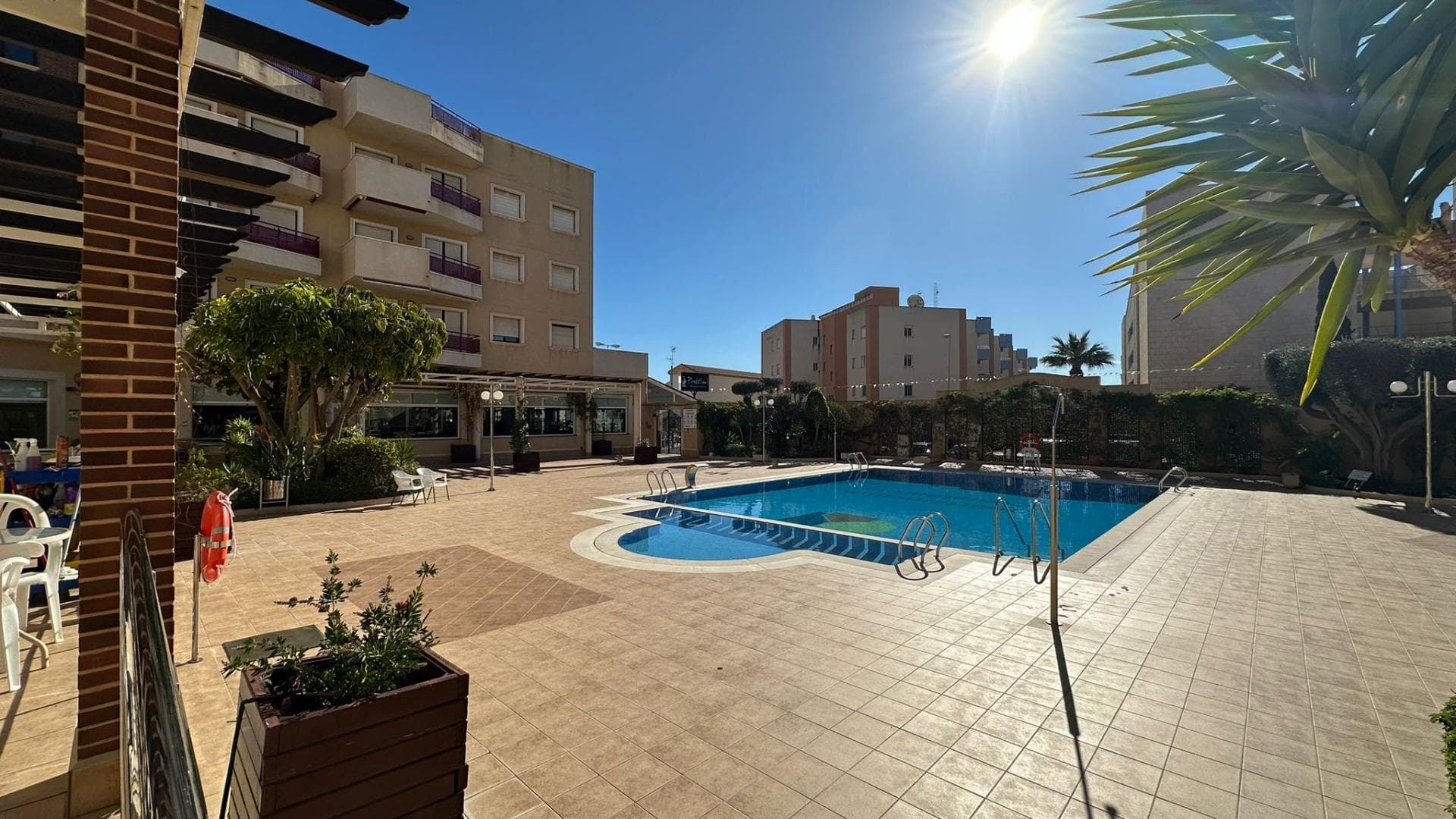 Discover this magnificent 2-bedroom, 1-bathroom apartment located in one of the most sought-after areas of Orihuela Costa, an ideal opportunity for those seeking to enjoy the Mediterranean lifestyle in a privileged setting. This property combines comfort, functionality, and excellent communal areas, including a communal swimming pool, parking space, and a pleasant terrace—features highly valued by both those wishing to live here year-round and those looking for a second home on the Costa Blanca. The apartment is sold fully furnished, allowing you to move in from day one without any additional investment. This also makes it an excellent opportunity for investors looking for a rental-ready property in an area with high tourist and residential demand. The apartment is situated within a quiet and well-maintained residential area, ideal for enjoying peace and comfort while remaining close to all the amenities you need for daily life. Upon entering the apartment, you'll find a welcoming, spacious, and bright living-dining room, which becomes the heart of the home. This living room offers a warm and comfortable atmosphere, perfect for relaxing after a day at the beach, spending time with family, or entertaining guests. The layout of the living room allows for the creation of different areas within the same space, including a relaxation area with a sofa and television, as well as a dining area where you can enjoy meals with family and friends. From the living room, you can access a lovely private terrace, one of the most attractive features of the property. This outdoor space is ideal for enjoying the wonderful climate of the Costa Blanca year-round. Here you can have breakfast al fresco, read a book in the sun, or relax in the afternoon while enjoying the Mediterranean breeze. The terrace adds value to the property, allowing you to enjoy the outdoors without leaving home, something especially appreciated in homes located in residential areas near the sea. The practical and functional kitchen is equipped with furniture and appliances that make everyday life easier. Its design makes the most of the available space, offering ample storage and a comfortable layout for cooking. The apartment features two spacious and bright bedrooms, designed for comfort and relaxation. The master bedroom offers ample space for a double bed and wardrobes, creating a tranquil and inviting atmosphere. The second bedroom can be used as a guest room, children's room, or even an office or workspace, adapting to the needs of each owner. The well-maintained and functional bathroom is fully equipped with everything necessary for daily use. Its practical layout allows for comfortable and efficient use of space. One of the great attractions of this property is its location within a complex that boasts a communal swimming pool, a true luxury, especially during the summer months. This space allows residents to enjoy refreshing swims, relax in the sun, or spend time with family and friends without leaving the complex. The communal areas are designed to offer comfort and quality of life to residents, making it the perfect place to unwind and enjoy the region's pleasant climate. Furthermore, the property includes a parking space, a highly valuable feature that provides convenience and security. Having a private space to park your vehicle makes daily life easier and avoids the worry of looking for parking, especially in coastal areas with a high influx of visitors.
