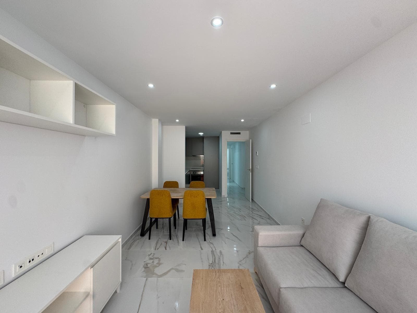 Discover a unique opportunity to live in the heart of Torrevieja, where the Mediterranean lifestyle blends seamlessly with comfort, well-being, and modern amenities. This apartment is more than just a home; it's an experience designed for those who value quality of life, everyday convenience, and the pleasure of savoring every moment. Located in one of the city's most sought-after areas, living here means having everything at your fingertips. From the moment you step outside, you'll feel the energy of a vibrant, dynamic environment brimming with possibilities. The center of Torrevieja is synonymous with convenience, proximity, and a lifestyle that allows you to leave the car behind and enjoy everything on foot. Imagine starting your days with natural light gently streaming through the windows, experiencing the tranquility of a brand-new home, ready to be enjoyed without a care in the world. A space where every detail has been carefully considered to offer comfort, functionality, and a contemporary aesthetic that perfectly complements modern trends. This apartment is designed for those seeking more than just a place to live. This is for those who want to feel good at home, disconnect from the daily grind, and find a space to relax, connect, and enjoy. The feeling of moving into a brand-new home, of entering a completely new space, brings unparalleled tranquility and a satisfaction that's hard to match. One of the great attractions of this property is the wellness experience it offers. Being able to enjoy a swimming pool in your own building is a luxury that completely transforms your daily life. It's not just an extra, but a lifestyle. Cooling off on hot days, relaxing after a long day, or simply enjoying the sun in a peaceful setting are small pleasures that become part of your routine here. In addition, there's the option of enjoying a sauna, an element that further enhances your quality of life. Having access to a space for relaxation and personal care without leaving home is a true privilege. The sauna is not only a place to disconnect, but also a space that promotes physical and mental well-being, helping you release tension and recharge your energy. Living in the heart of Torrevieja also means being surrounded by a wide range of services, leisure activities, and dining options. Restaurants, cafes, shops, and all the necessary amenities are part of your daily life. Every day can be different, with new opportunities to enjoy, discover, and experience the city to the fullest. Furthermore, the proximity to the sea adds immeasurable value to this property. The possibility of strolling along the Mediterranean, enjoying its beaches, or simply feeling the sea breeze makes all the difference. It's a lifestyle that combines tranquility with vitality, creating the perfect balance. This apartment is ideal both for those seeking a permanent residence and for those looking for a second home where they can escape and enjoy the pleasant climate year-round. Torrevieja is known for its excellent weather, allowing you to enjoy its advantages at any time of year. It also represents an excellent investment opportunity. The demand for new homes in the city center is high, and having extras like a swimming pool and sauna significantly increases its appeal. Whether for rental or resale, it's a property with great profitability potential. The atmosphere in this area is welcoming and cosmopolitan. People from different nationalities choose Torrevieja as a place to live or invest, creating a very enriching international environment. This not only brings dynamism to the city but also reinforces the value of properties in the area.