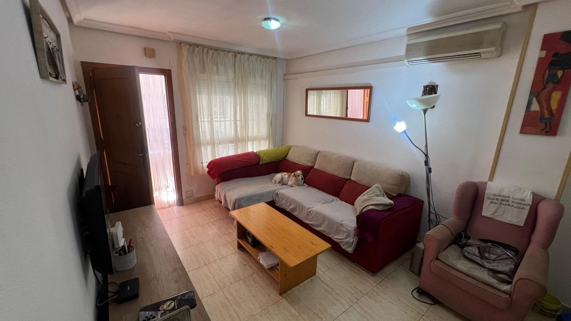 Discover a home where tranquility, comfort, and the Mediterranean lifestyle come together to offer you a unique experience in Torrevieja. This ground-floor apartment is much more than just a house: it's a space designed to enjoy the present, disconnect from the daily grind, and live calmly, close to the sea and surrounded by everything you need. Located in one of the city's most sought-after areas, just steps from the iconic Acequión Beach, this property offers the perfect balance between proximity to the sea and urban convenience. Living here means being able to integrate the beach into your daily life, stepping out of the house and, in a matter of minutes, being able to enjoy the Mediterranean. The feeling of living near the sea transforms your routine. It's waking up to a special light, feeling the fresh air, and knowing that you have one of life's greatest privileges at your fingertips: direct contact with nature. Strolling along the shore, listening to the waves, or simply sitting and contemplating the horizon become small moments that contribute to a high quality of life. This home exudes a sense of calm from the very first moment. It's a welcoming space, designed for those who value tranquility and comfort. The ground-floor layout provides extra convenience, facilitating access and offering a sense of connection to the surroundings that few homes can match. It's the ideal home for those seeking practicality without sacrificing well-being. Here, everything is designed to make life easier, more comfortable, and more enjoyable. This home adapts to different lifestyles, from those looking for their first residence to those seeking a seaside retreat. Natural light plays a fundamental role in this property. The orientation fosters a warm and luminous environment, creating a welcoming atmosphere throughout the day. This feeling of brightness and spaciousness is noticeable from the very first moment, making the space even more appealing. Living on the ground floor also provides a special connection to the outdoors. It's a more accessible, comfortable, and practical way of living. No stairs, no complications, with accessibility that makes all the difference in daily life. The location of this home is another of its great strengths. This is a well-established neighborhood with all necessary amenities within easy reach. Supermarkets, shops, restaurants, and everything you need are close at hand, allowing you to enjoy a practical and stress-free life. Furthermore, its proximity to Acequión Beach adds immeasurable value. Not only for its proximity, but also for the lifestyle it entails. Living near the sea is synonymous with well-being, tranquility, and enjoyment. This home is perfect for those seeking a space to relax, disconnect, and feel good. It's a place where each day can begin peacefully and end with special moments. It's also an excellent option for those looking for a second home. A place to escape the fast pace of life, enjoy the pleasant climate, and recharge. Torrevieja is known for its exceptional climate, allowing you to enjoy this area year-round. The property also presents great investment potential. Demand in this area is constant, and homes like this are highly valued for both holiday and long-term rentals. This is an opportunity to generate income in a strategic location. The atmosphere in this area is welcoming and family-friendly, with a mix of local and international residents who bring dynamism and diversity. It's an environment where it's easy to fit in, where everything invites you to stay. Every corner of this home invites you to imagine a comfortable, simple, and pleasant life. It's the kind of home where everything flows, where there are no complications, and where you can enjoy everyday life in peace.