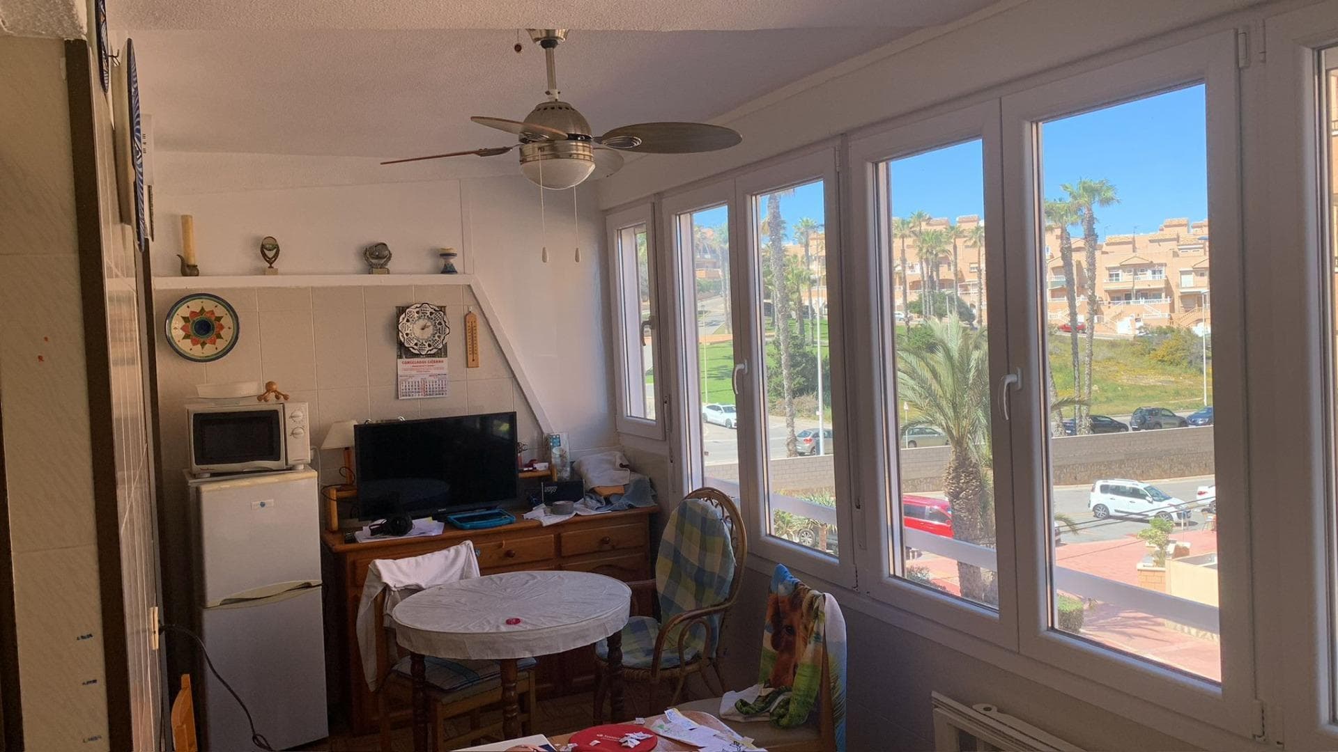 We are pleased to present this magnificent apartment situated in one of the most sought-after and exclusive areas of the coast, in Cabo Cervera, just 100 metres from the sea and right on the seafront, making it a unique opportunity for those wishing to enjoy a home by the Mediterranean with all modern conveniences. The property stands out in particular for its excellent south-facing aspect, one of the most highly valued in the property market, as it guarantees natural light throughout the day. This feature not only provides constant light in every room, but also creates a warm, welcoming and comfortable atmosphere all year round. The property benefits from the Mediterranean sun from the early hours of the morning until sunset, making every corner a pleasant space to live in or enjoy during holidays. Located in the renowned Miramar Building, this apartment perfectly combines location, functionality and quality of life. The property has three bedrooms, all well laid out, with spaces designed to offer comfort, relaxation and versatility, suiting both families and those looking for additional guest rooms or even a space to use as an office. The bathroom is fully equipped and functional, designed for everyday convenience, with a practical layout that makes the most of the available space. The open-plan kitchen blends harmoniously with the living room, creating an open, modern and very bright atmosphere. This type of layout enhances the feeling of spaciousness and allows for greater interaction between the spaces, making it ideal for both daily use and moments of leisure or family gatherings. Without a doubt, one of the greatest attractions of this property is its fantastic terrace. It is a versatile space that can be enjoyed both glazed and open-air, allowing for year-round use, regardless of the weather. From the terrace, you can enjoy lovely sea views, making it a perfect spot to relax, enjoy breakfast in the sun, read or share special moments with family and friends whilst taking in the Mediterranean surroundings. The location is simply unbeatable. Being right on the seafront and just a few metres from the sea, access to the beach is quick and convenient. Furthermore, the area has all the necessary amenities within easy reach, such as supermarkets, restaurants, cafés, public transport and leisure facilities, allowing for a practical and hassle-free lifestyle, whether as a permanent residence or for holiday use. Cabo Cervera is renowned for its tranquillity, natural surroundings and proximity to other areas of interest, which adds even more value to this property. It is the perfect setting for those seeking to unwind without sacrificing the convenience of having all amenities nearby. In short, this apartment combines all the features needed to make it an excellent choice: a prime location, unbeatable orientation, sea views, well-designed spaces and plenty of natural light. It is a home that offers quality of life, comfort and a direct connection to the Mediterranean lifestyle. An exceptional opportunity to acquire a unique property on the seafront, ideal both for personal enjoyment and as a high-potential investment.