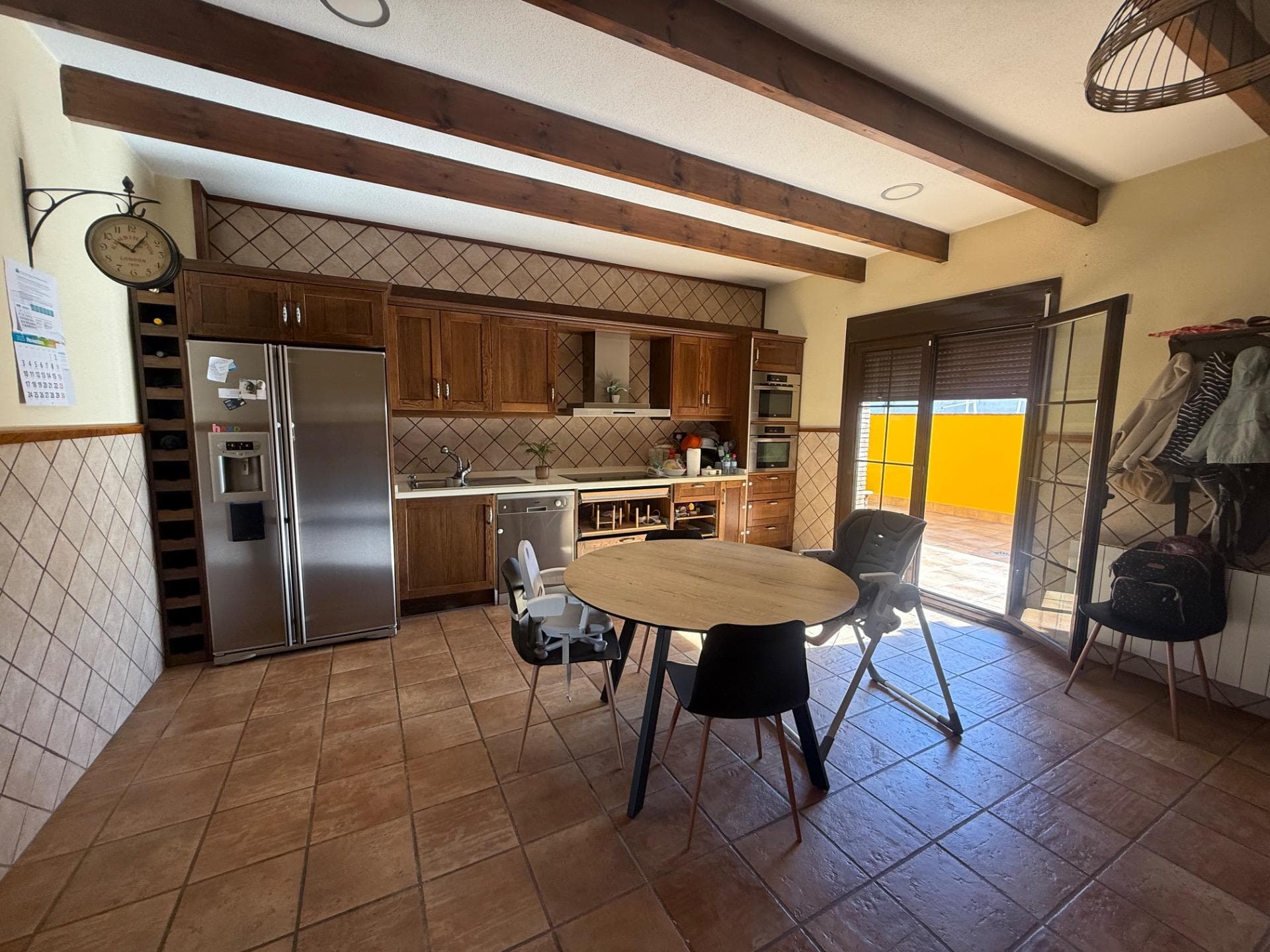 We are delighted to present this exclusive village house in Avileses (Murcia)– a property that combines space, quality and warmth in a peaceful and well-connected environment. Built in 2006, the home stands out for its excellent finishes, natural brightness and well-planned layout. Located on the first floor, it offers a built area of 174.15 m² and usable space of 141.12 m², as well as a private solarium of 59 m² and a closed garage of 33.26 m². The property comprises three spacious bedrooms and two full bathrooms, designed to provide both comfort and privacy. The master bedroom features a walk-in wardrobe, en-suite bathroom and direct access to the interior terrace, which also connects with two other bedrooms, providing excellent natural light and cross ventilation throughout the home. The kitchen, large and fully fitted, is one of the most impressive areas of the property. From here, there is access to a laundry and storage area, offering generous space for everyday convenience. The house has been built using walnut wood for the interior carpentry and finishes, adding a sense of warmth and elegance to each room. It is also equipped with ducted air conditioning and a central heating, ensuring optimal comfort all year round. From inside the property, you can access the private solarium of 59 m², which enjoys open views of the mountains – a perfect space to enjoy the Mediterranean sun or create a relaxing outdoor area for family and friends. The property also includes a closed garage of 33.26 m², with direct and easy access from the street. The property is located in Avileses, a charming village within the municipality of Murcia, offering a quiet, family-friendly and well-connected environment. The village provides all essential amenities such as supermarkets, pharmacy, school, sports areas and restaurants. It is also just five minutes from the Balsicas train station, with direct connections to Murcia city. For golf lovers, Avileses is surrounded by several prestigious golf courses, including Hacienda Riquelme Golf (5 minutes away), La Torre Golf Resort (10 minutes away) and El Valle Golf Resort (15 minutes away). The location allows easy access to key destinations in the region: Murcia city is just 20 minutes away, the beaches of the Mar Menor such as Santiago de la Ribera are only 20 minutes away, and the Murcia International Airport (Corvera) is just 15 minutes away. Surrounded by open countryside and nature, Avileses retains the authentic charm of traditional Murcian villages, offering an excellent quality of life and an ideal setting for those seeking space, privacy and proximity to both the city and the coast. If you are interested in this property and would like to arrange a viewing, please do not hesitate to contact us!