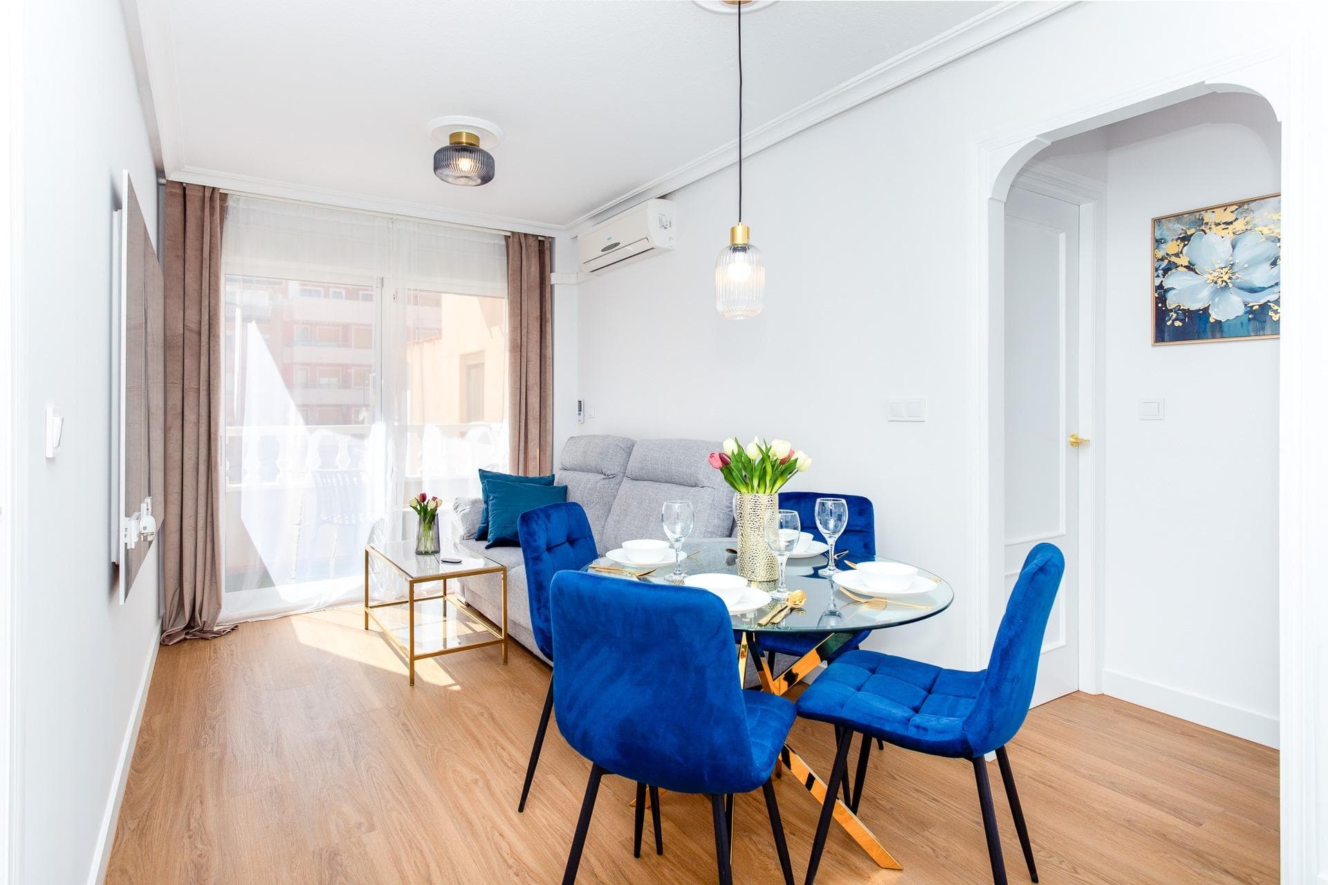 Discover this beautiful, completely renovated ready-to-move-in apartment located in the heart of Torrevieja, just a 5-minute walk (approx. 400 m) to the sea! Shops, restaurants, cafés, bus stops, and all essential services are only a few meters away, making everyday life very convenient. The apartment is located in a well-maintained building with clean common areas and an elevator. There is also an underground parking garage in the building, with the possibility of acquiring a parking space (subject to availability). The apartment is very bright and sunny, with a functional layout, featuring a lovely south-west facing terrace with open, unobstructed views - something truly rare in an urban setting - where you can fully enjoy the Mediterranean sun. All windows are exterior, ensuring plenty of natural light and good ventilation throughout the home. It is tastefully furnished in a modern style with brand-new appliances, making it ideal for year-round living, a holiday home, or as a rental investment. Highlights: - Fully renovated - brand new condition - Bright and sunny with south-west orientation - All windows are exterior - Stylish, modern interior with new furniture and appliances - Fully equipped, modern kitchen - Bathroom with walk-in shower - Comfortable vinyl flooring throughout - Smooth finished walls - Upgraded electrical system (5.75 kW with official certificate) - Air conditioning and ceiling fans - Videophone system - Plenty of storage and built-in cabinets Don’t miss this opportunity — get in touch to arrange a viewing or for more information. The indicated final price does not include taxes (ITP/VAT/ IVA) nor notary and registry expenses, which will be calculated according to the current tariffs and rates.
