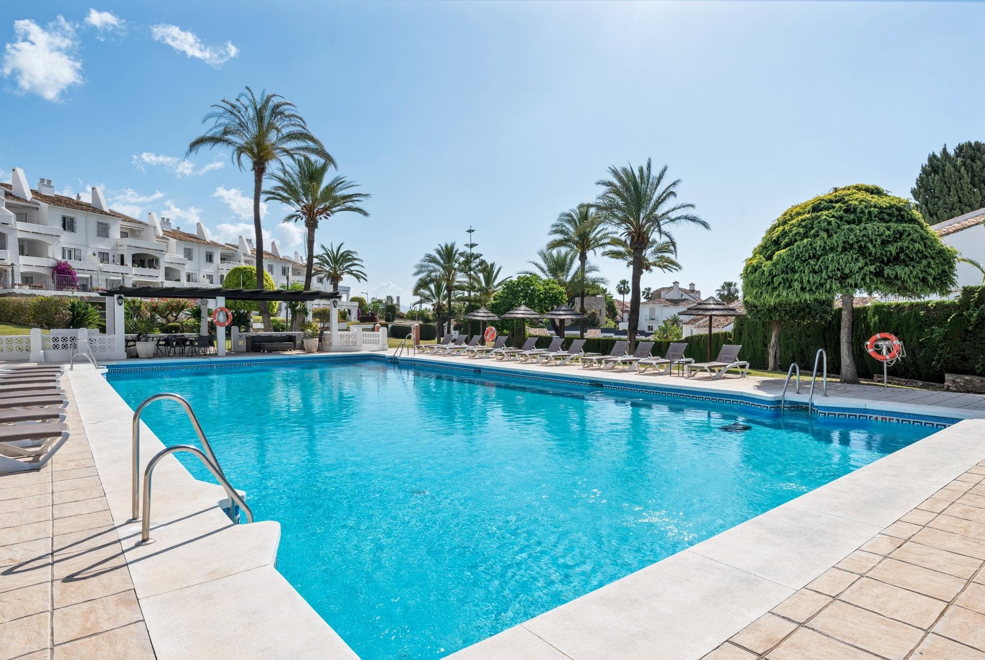 Exceptional design meets an unbeatable location in this beautifully refurbished 3-bedroom, 3-bathroom ground-floor apartment, situated in Marbella's highly sought-after Malambo Urbanisation. Boasting stunning direct sea views, this elegant home offers the ultimate Mediterranean lifestyle. The interior features three spacious double bedrooms, each complete with a modern en-suite bathroom. A fully fitted, open-plan kitchen seamlessly flows into a stylish living and dining area, creating a bright, contemporary space perfect for entertaining or relaxing. Step outside to a generous south-facing terrace to enjoy panoramic views of the sea and the surrounding greenery. Set within impeccably maintained tropical gardens, residents enjoy access to two communal swimming pools, including a dedicated children’s pool. Practicality is ensured with an included private parking space and storage room. Adding a highly modern touch, the parking level features an exclusive coworking space with direct pool access—ideal for remote professionals or business meetings. Renowned for its charm and tranquility, Malambo is perfectly situated. Daily amenities such as supermarkets, boutique shops, cafés, restaurants, and premium beach clubs are right at your doorstep. Located directly opposite Centro Plaza and just a 5-minute stroll to the world-famous Puerto Banús marina, the convenience is unmatched. With its prime location, high-end finishes, and superb on-site facilities, this property is an outstanding investment opportunity—whether you seek a luxury holiday retreat, a highly desirable rental property, or a permanent residence on the Costa del Sol.