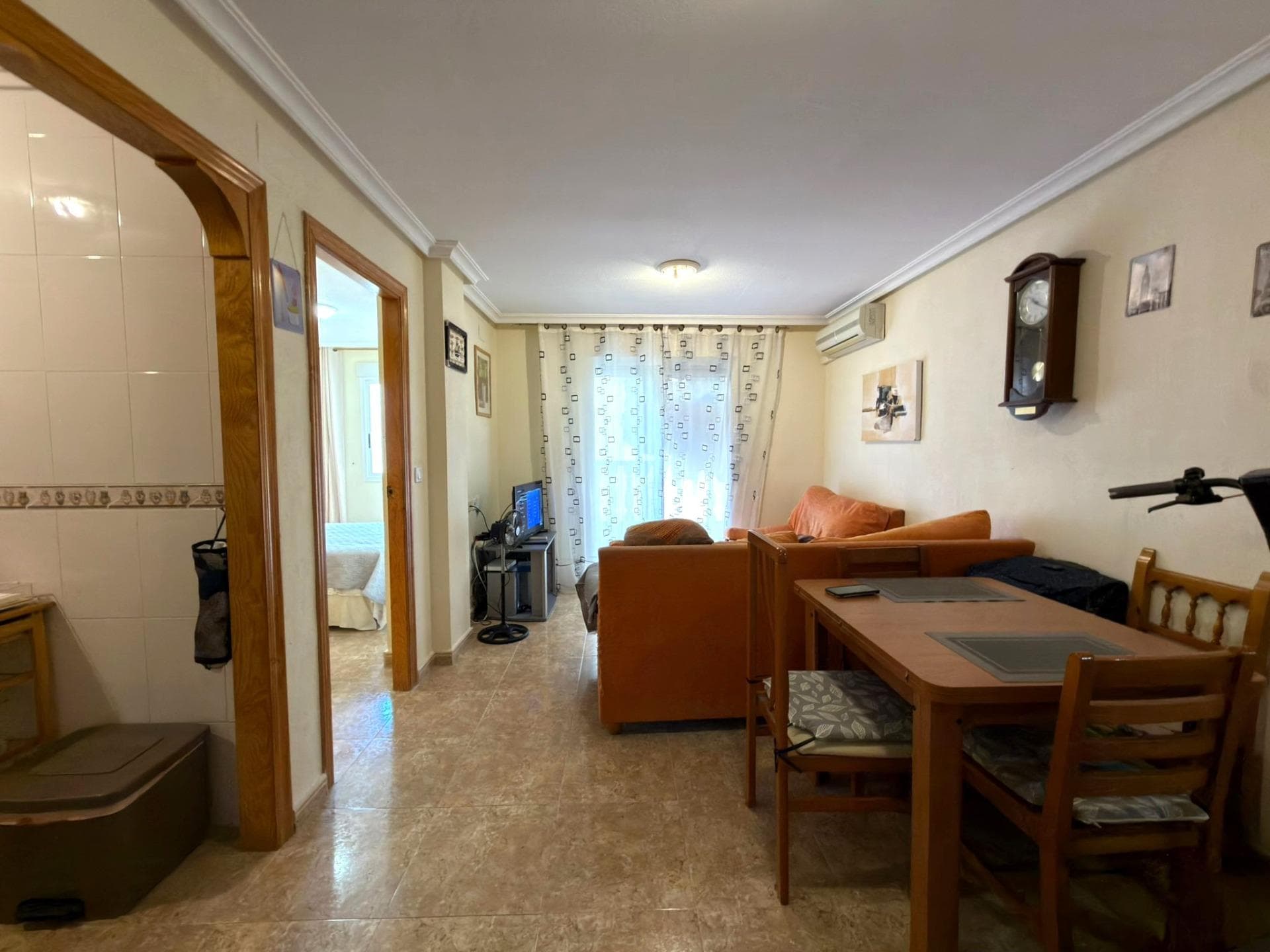 Cozy 2-bedroom apartment with a parking space in Torrevieja Located on the second floor, this property stands out for its practical and bright layout, featuring two bedrooms that provide the ideal space for both a primary residence and a vacation home by the sea. It is move-in ready, requiring no renovations or additional investments. The living room serves as the heart of the home, creating a pleasant atmosphere for spending time with family or friends, while the kitchen and the rest of the rooms have been designed to offer everyday comfort. It also features a cozy terrace, perfect for enjoying the excellent Mediterranean climate year-round. One of its major attractions is that the parking space is included in the price—an increasingly sought-after added value that provides convenience, security, and peace of mind all year round. LOCATION: Torrevieja is in the province of Alicante (Costa Blanca). It is famous for its Mediterranean climate and its coast. We cannot forget its promenades where we can find some restaurants along the fine sandy beaches. It also has many excellent beaches such as Playa de los Náufragos, Playa de los Locos and Playa de la Mata. Therefore, it is considered a remarkable tourist town where the environment takes an important place as an important tourist attraction. In addition, we can find many shopping centres (Habaneras, La Zenia Boulevard), golf courses, sport centres, hospitals (such as Hospital Universitario de Torrevieja) and airports such as Alicante Airport (35 km away) and Region of Murcia International Airport (43 km away). DISTANCE TO THE SEA: 300m Should you have any question do not hesitate to contact us!