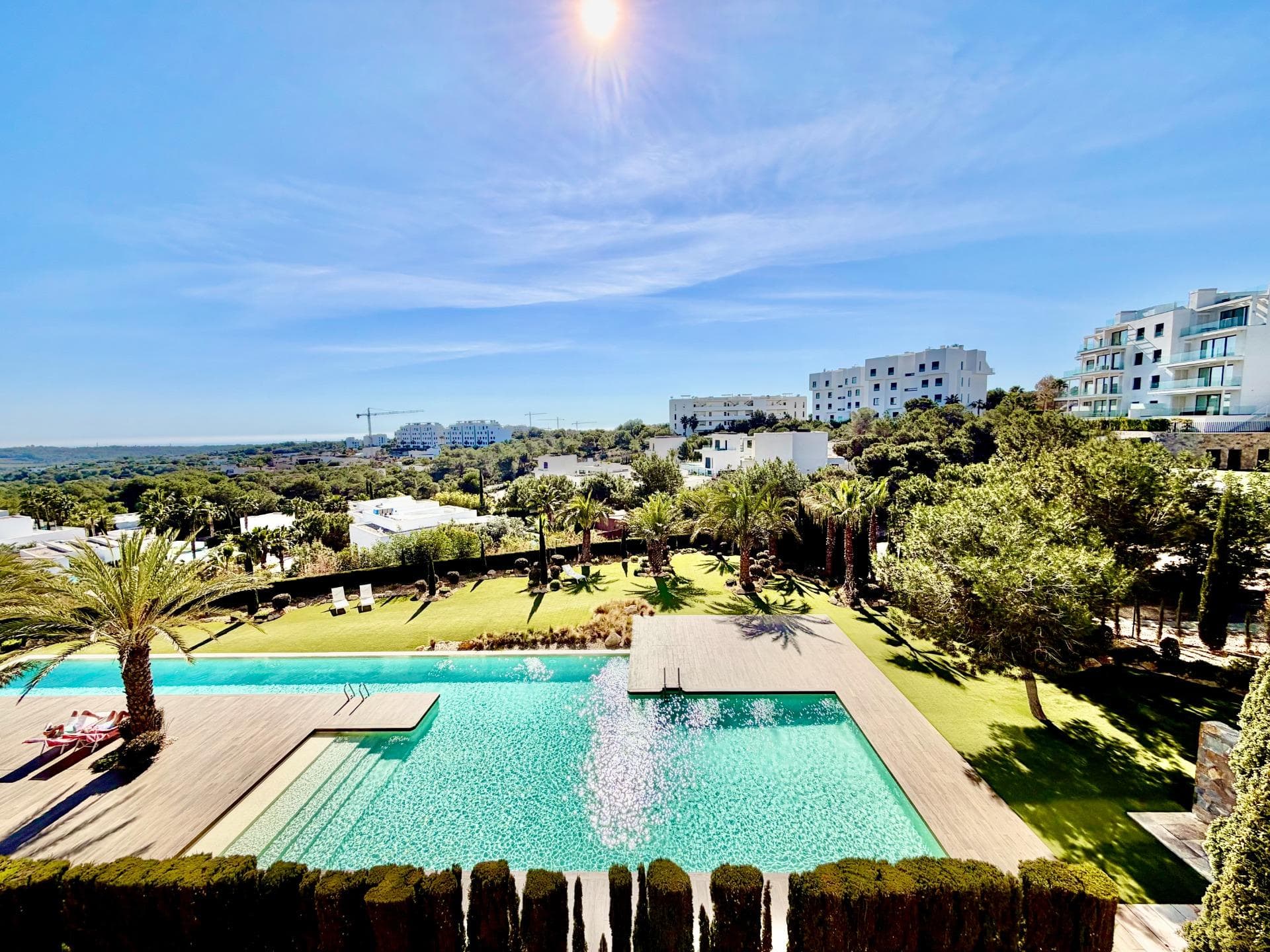 Beautiful Ground Floor Apartment in Las Colinas Golf – Space, Privacy & Southern Light Welcome to this stunning south-facing ground floor apartment in the exclusive Naranjo community of Las Colinas Golf. Built in 2020 and maintained in excellent condition (the building was freshly painted in 2025), this property offers comfort, privacy and effortless Mediterranean living. With 90 m² built, the apartment features two spacious bedrooms and two fully equipped bathrooms with underfloor heating. The bright living area flows seamlessly into a generous 35 m² front terrace overlooking the beautifully maintained communal green areas with open views towards the sea. At the back, a second private terrace and garden area provide extra privacy and a shaded retreat during the warm summer months. The fully equipped kitchen includes high-quality appliances, and the property is sold completely furnished, ready to move in. Designed for modern comfort, it also features a smart home system, air conditioning (hot and cold), LED lighting, electric shutters in all rooms, and a water filtration system. Residents of Naranjo enjoy access to landscaped gardens and a stylish communal swimming pool. The apartment also includes a private underground parking space and a storage room, with lift access for added convenience. Located just 2 km from golf and amenities, 7 km from the beach, and approximately 45 minutes from the airport, this is an ideal property for those looking for a refined second home, an investment, or a permanent residence in one of the most prestigious resorts on the Costa Blanca. ✨ A place where comfort, quality and southern sunshine come together beautifully. Contact us to arrange your private viewing.