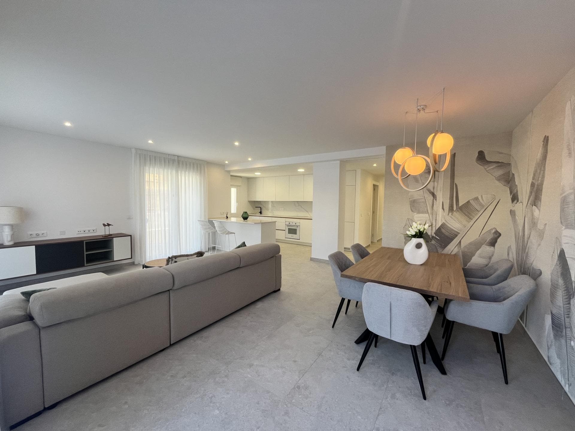 Two beautiful apartments for sale in Torrevieja – Move-in Ready! Discover these modern ground-floor apartments built in 2024, designed for comfort and ease. Each apartment features 3 bedrooms, 2 bathrooms, an open kitchen, and a spacious terrace perfect for enjoying Mediterranean living. Fully furnished and equipped with air conditioning, built-in wardrobes, white goods, and a security door. Enjoy the community pool, green areas, and a private garage for your car. Ideally located just 1 km from the beach, close to shops and restaurants, and 13 km from the golf course. The airport is 33 km away. Whether you are looking for a permanent home or a holiday retreat, these apartments are key ready and waiting for their new owner.