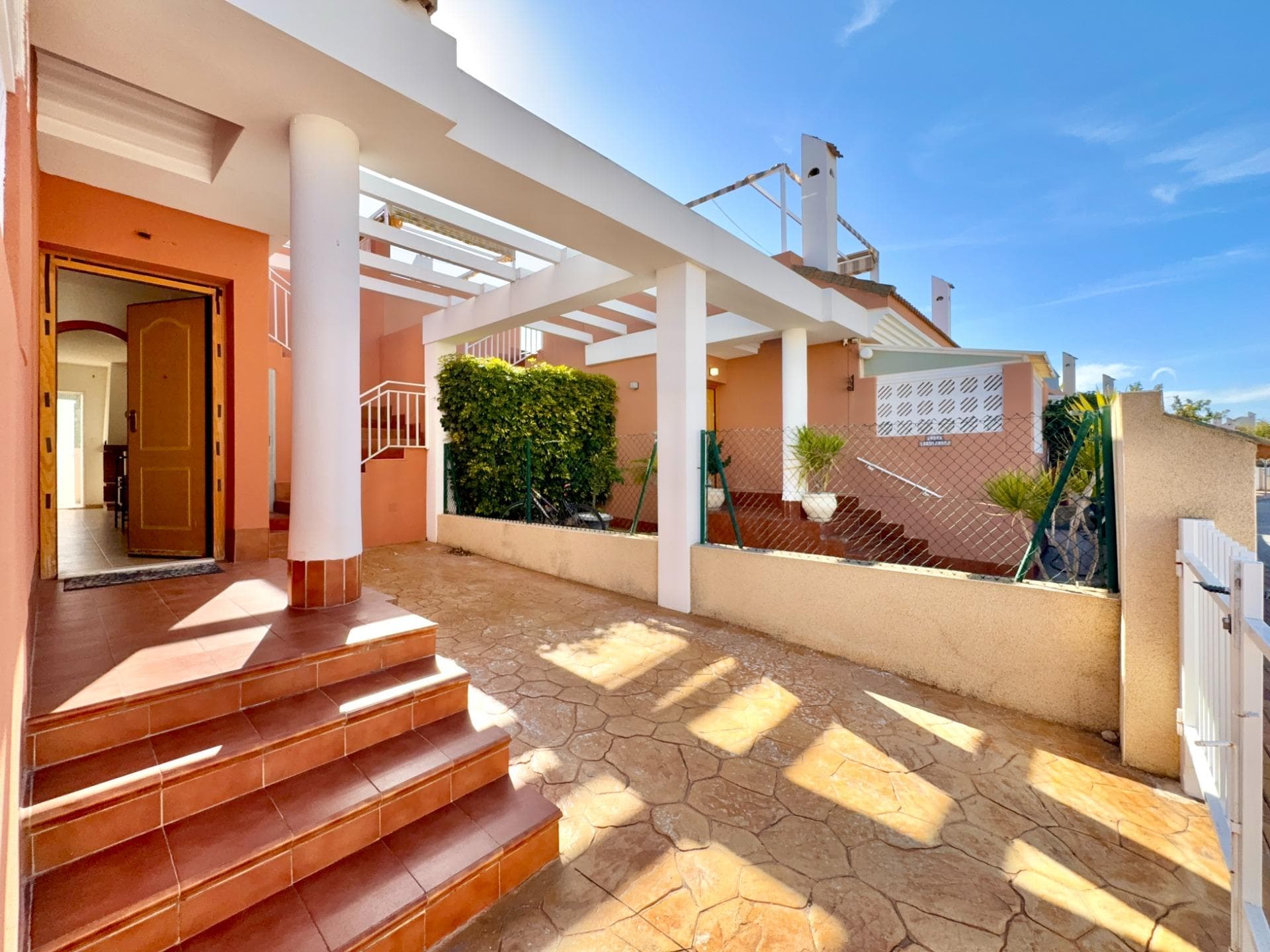 house with solarium and open nature views step inside this 3 bedroom, 2 bathroom house, set within a pleasant and well maintained community that offers a great balance between lifestyle and comfort. on the ground floor you find a spacious terrace, perfect for outdoor dining and relaxing. upstairs, the property benefits from a private rooftop solarium, where part of the structure has been reinforced, offering the ideal setup for a future jacuzzi and a perfect spot to enjoy the sun and the open views. the kitchen has been recently renovated, giving the home a fresh and updated feel, while the rest of the property offers a solid base with plenty of potential to personalise. one of the real highlights is the open outlook over a protected natural area, meaning the views will remain peaceful and uninterrupted over time. the community itself offers excellent amenities including a gym, padel and tennis courts, and a beautiful swimming pool, creating a very complete living environment. daily amenities including supermarkets, bars, restaurants and shops are all within walking distance, offering a very easy and comfortable day to day lifestyle where a car is hardly needed. this is a great opportunity for those looking for a well located home with generous outdoor space, excellent community facilities and strong long term value thanks to its unique natural surroundings.