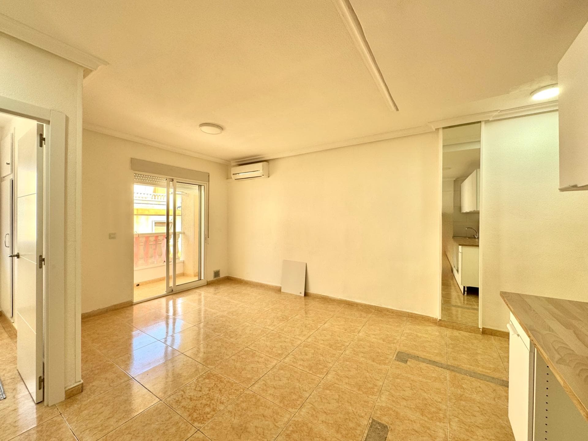 modern apartment in the heart of torrevieja welcome to this beautifully renovated apartment, ideally located in the vibrant centre of torrevieja. a home where comfort, design and location come together perfectly. the apartment features two spacious bedrooms and a modern bathroom. both the kitchen and bathroom have been fully renovated and finished with high-quality materials, creating a contemporary and elegant atmosphere. thanks to its dual south- and north-facing orientation, the property enjoys abundant natural light throughout the day. the open-plan living area flows seamlessly into the modern kitchen, creating the perfect space to relax or entertain guests. located just 900 metres from playa del cura, you can enjoy an easy stroll to the beach, charming restaurants, shops and all essential amenities. whether you are looking for a permanent residence, a holiday retreat or a smart investment, this apartment offers it all. the asking price reflects the property as presented in the photographs. should you wish, additional features such as a boiler, refrigerator, hob, dishwasher and furniture can be installed. please note that the purchase price will be adjusted accordingly. a unique opportunity to live or invest in a prime location on the costa blanca.