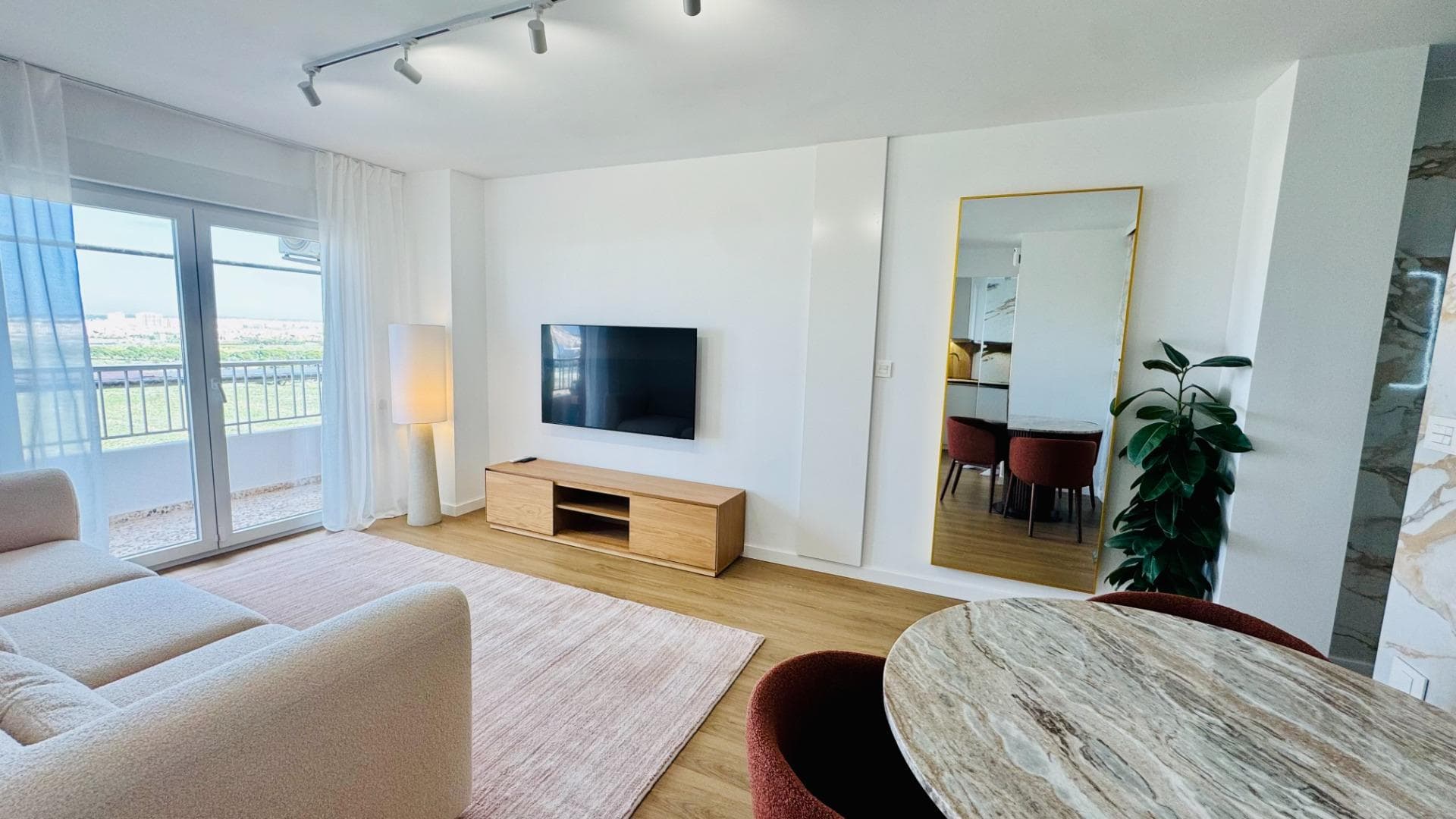 Fully renovated corner penthouse with breathtaking panoramic views welcome to this stunning penthouse in the prestigious area of Punta Prima, just 500 meters from the sea. located on the 6th floor and positioned on the corner of the building, this unique apartment offers maximum privacy, incredible natural light and panoramic views that truly make it stand out. from the terrace you can enjoy spectacular sea views, beautiful sunrises and sunsets, open night views over the city, the mountains in the distance and even the famous salt lakes of the costa blanca. the property has been completely renovated with high quality materials and elegant finishes, creating a modern yet warm atmosphere. large panoramic sound-insulated windows open directly onto the terrace allowing the apartment to feel bright, open and peaceful all day long. inside you will find 2 comfortable bedrooms, 1 stylish bathroom and a beautiful open living space finished with designer furniture, natural stone details and large-format porcelain flooring. the apartment also comes fully equipped with inverter air conditioning with wifi control, a programmable boiler, qled smart tv, dishwasher, washing machine, alarm system and subtle ambient led lighting. the building offers a communal swimming pool, lift access and gated communal parking with a roof. another important advantage is that the full facade renovation of the building is already in progress and fully paid, so the new owner will not have any additional costs. this penthouse already has a tourist license in place, which means a new license can be reissued for the future owner — making it not only a beautiful home by the sea, but also an excellent investment opportunity in one of the most demanded areas of the Costa Blanca.