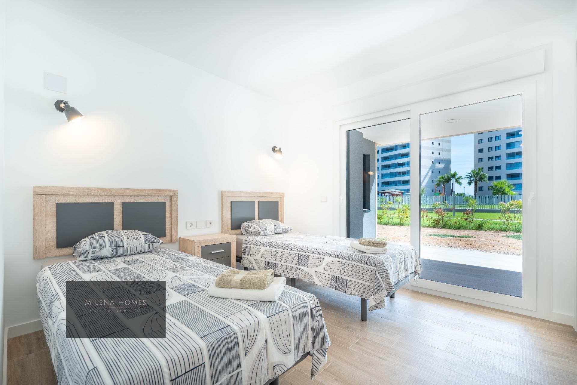 2 Bedrooms | 2 Bathrooms | Private Garden | South-Facing We present to you an apartment that captivates from the very first moment. Located on the ground floor of the prestigious Residencial Posidonia, this home combines modernity, privacy, and the charm of authentic Mediterranean style. Just a few steps from the sea, it is the perfect place for those who want to enjoy tranquility without sacrificing luxury. ✨ Ready to move in and enjoy The apartment is delivered fully furnished and equipped, so you only need to open the door and start feeling at home. Its practical design, large windows, and south-facing orientation fill every room with natural light, creating a warm, bright, and welcoming atmosphere throughout the year. It features: 2 double bedrooms, both with built-in wardrobes and direct access to the garden 2 full, elegant, and modern bathrooms with underfloor heating for superior comfort Fully equipped kitchen, modern and functional Spacious living-dining room, connected to the garden and perfect for family or social gatherings 🌿 A private garden to enjoy the outdoors all year round The standout feature of this property is its private garden — a versatile space full of possibilities: sunbathing, relaxing with a book, setting up a chill-out area, or hosting outdoor meals… A small oasis that makes this apartment the ideal choice for both year-round living and memorable vacations. ⭐ Details that make the difference Ducted air conditioning Electric blinds Solar-powered hot water system Energy certification C/B Accessibility for people with reduced mobility Additionally, it includes: Underground parking space Private storage room 🌊 Posidonia: One of the most exclusive residential complexes by the sea Living in Posidonia means enjoying unique facilities designed for your utmost well-being: Three communal swimming pools, including: Infinity pool with sea views Children’s pool Heated pool Outdoor Jacuzzi Impeccable landscaped areas Gated community with 24/7 security and video surveillance All of this in an exceptional location, just a short walk from the promenade, restaurants, supermarkets, medical centers, and all the necessary services for a comfortable and practical life. 💎 A home to live, enjoy, and also invest This apartment has it all: quality, location, design, and comfort. A perfect opportunity as a primary home, second residence, or investment with high returns on the Costa Blanca. ✨ A modern, secure home full of charm in one of the most sought-after complexes in Punta Prima. Don’t miss this opportunity! 📩 Contact us for more information or to arrange a viewing.