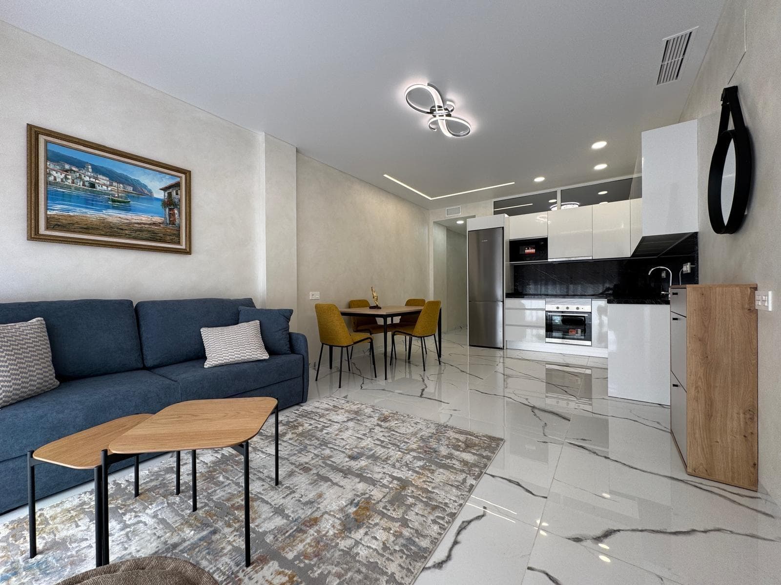 Exclusive totally refurbished apartment just 50 meters from Playa del Cura, Torrevieja 🌊 An elegant completely renovated apartment is for sale, located in one of the best locations in Torrevieja, just 50 meters from the famous Playa del Cura. One of the main advantages of this property is that, after the comprehensive renovation is finished in 2025, no one has lived in the apartment, so it is delivered practically brand new. 🏡 Main features: * Total area: 67 m² * Usable area: 55 m² * Patio and interior terrace: 15 m² * Distribution: 2 bedrooms and 2 bathrooms * Year of construction: 1982 * Year of comprehensive renovation: 2025 * Distance to the beach: 50 meters ✨ Condition and equipment: The home has been completely renovated with modern materials and quality finishes: ✔️ Comprehensive renovation completed in 2025 ✔️ Unused home after renovation ✔️ Centralized air conditioning (cool/heat) ✔️ Modern kitchen and bathrooms ✔️ Spacious and bright areas 🌿 Patio and interior terrace: It has a pleasant patio and interior terrace of 15 m², perfect for creating a resting area, outdoor dining or chill-out space. 🛋️ Sold fully equipped: The home is sold with: ✔️ furniture ✔️ appliances ✔️ decoration — just as shown in the photographs. 📍 Location: One of the best areas of Torrevieja: * just 50 meters from Playa del Cura * promenade, restaurants, and cafes just steps away * supermarkets, pharmacies, and shops nearby * high rental demand throughout the year 💼 An excellent opportunity for both living and investing in one of the most sought-after areas of the Costa Blanca.