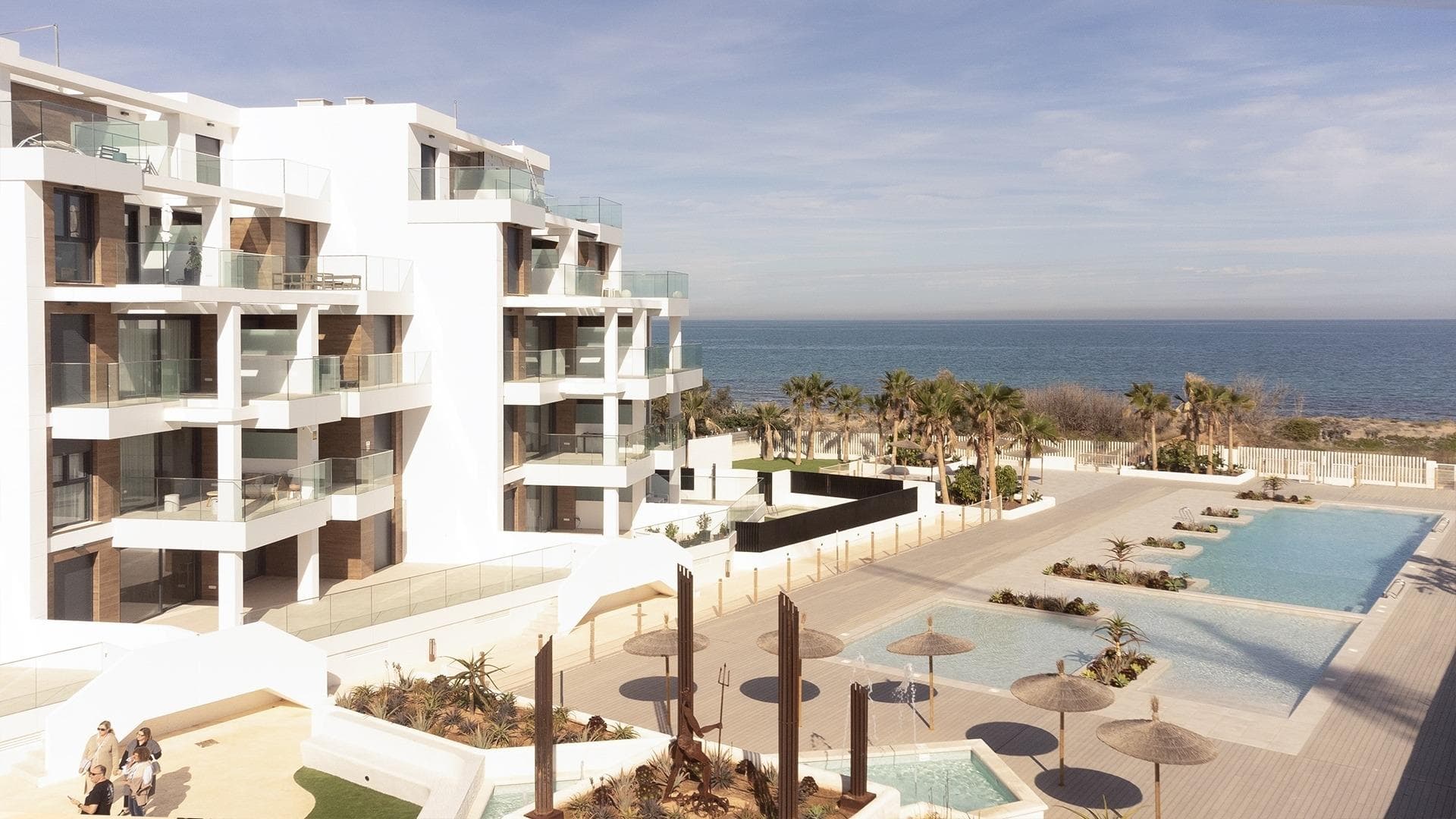 MEDITERRANEAN HOUSING A FEW METERS FROM THE SEA Exclusive complex of Mediterranean construction a few meters from the sea. On the beachfront, in front of L´Estanyo beach (7 km from the town center). Apartments and penthouses with two and three bedrooms, all with sea views. Magnificent common areas with a large garden area and two swimming pools, one for children. In an unbeatable location, in the area known as L´Estanyo that gives its name to its beach, with calm waters, an extensive area of ​​golden sand surrounded by all facilities and services, as well as leisure and restaurant venues.