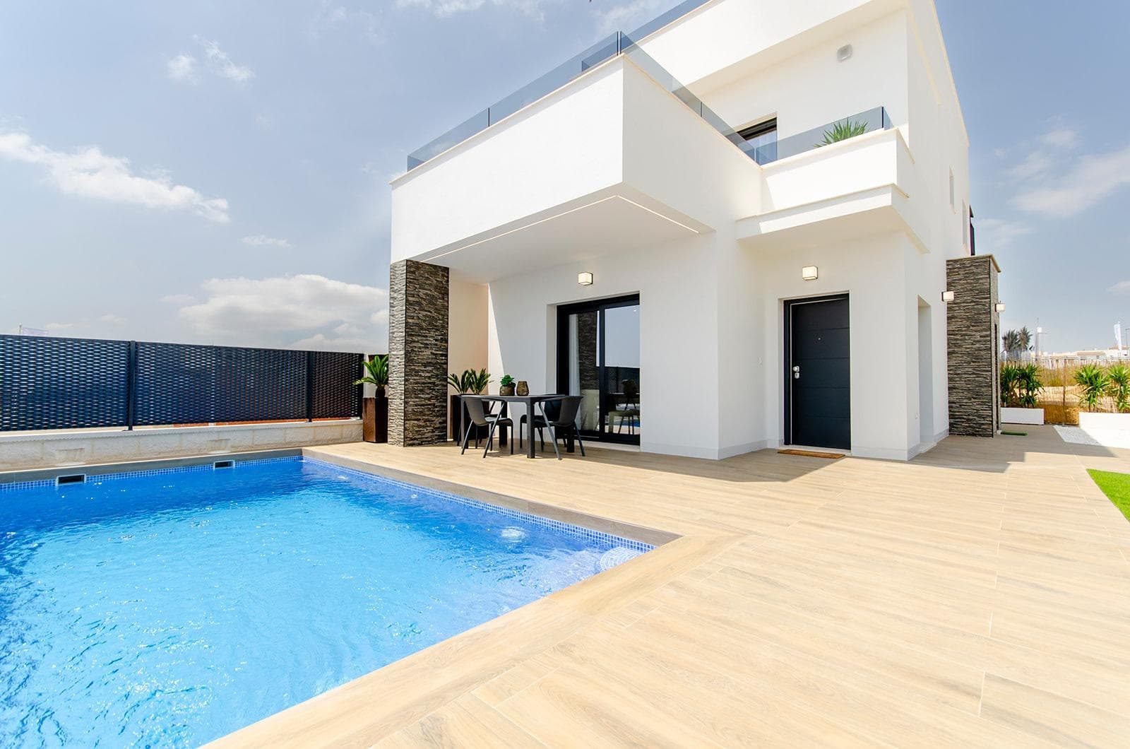 NEW BUILD VILLAS IN VISTABELLA GOLF RESORT New Build luxury villas built over 2 floors situated in Vistabela golf resort, between San Miguel and Los Montesinos in the Orihuela Costa. Villas with 3 bedrooms, 3 bathrooms, an open plan living room with the kitchen, private garden with the pool and parking space. An options you can have a private solarium at an extra cost. At Vistabella Golf there is space for everyone. The course is designed so that each player can enjoy it from start to finish. Its undulating streets, strategic bunkers or lakes are some of the features that make it one of the most attractive designs in the area, where every stroke is a challenge and a pleasure for the senses. The 18 Holes of Vistabella Golf, par 72 and more than 6,000 meters in length have been designed following the guidelines of the modern fields with 4 tees of great amplitude in each hole, wide fairways and raised bunkers. The Vistabella Golf club house &amp; restaurant &amp; local bars &amp; shops are within 5 minutes walk. The busy town of San Miguel de Salinas &amp; Los Montesinos are 5 minutes drive away &amp; the lovely Blue flag beaches at Guardamar are just 15 minutes drive away.  Alicante airport is 35 minutes away &amp; the new Corvera Murcia airport is 45 minutes away.