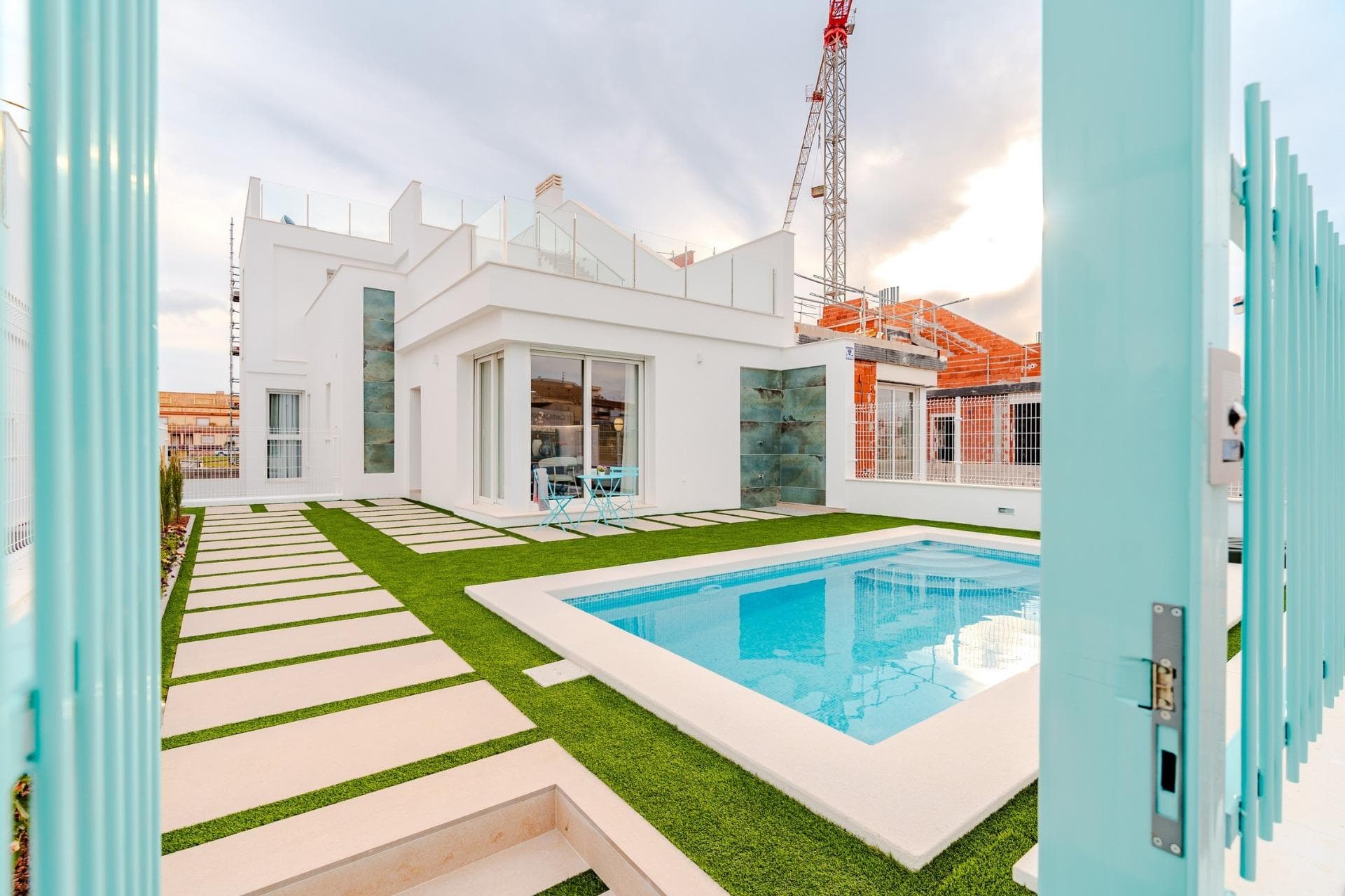 New Build Villas Near La Serena Golf and the Beach in Los AlcázaresDiscover the exclusive New Build Villas in the prestigious Torre del Rame area of Los Alcázares, Murcia. Known for its Mediterranean climate, this location offers easy access to both La Serena Golf and the beautiful beaches of the Mar Menor, making it an ideal place for leisure and relaxation.Property Options and FeaturesChoose between two stunning villa models: a detached or semi-detached option. Both offer 3 bedrooms, 3 bathrooms, a basement with a garage, a private pool, and a spacious solarium. These modern, elegant designs feature bright, open spaces filled with natural light, high-quality finishes, ducted air conditioning, and underfloor heating in the bathrooms. Each villa also includes a landscaped garden and fully equipped kitchen.Prime Location and Easy AccessConveniently located near the AP7 motorway, the villas are well-connected to the Mediterranean coastline, allowing you to explore the diverse beauty of the region. The area offers a wide range of nearby amenities including supermarkets, shops, sports centers, schools, and pharmacies, ensuring a comfortable, convenient lifestyle in a peaceful residential setting.Nearby Points of Interest  La Serena Golf: 1 km  Mar Menor Beach: 1 km  Murcia Airport: 35 km  Cartagena Port: 22 km  Local Shopping Center: 3 km