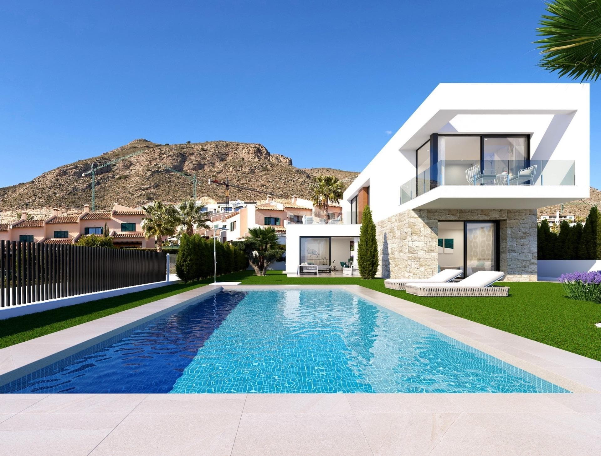 Luxurious New-Build Villas in Sierra Cortina, FinestratExplore the elegant new development of independent villas in the exclusive neighborhood of Sierra Cortina, Finestrat. Nestled in a picturesque area close to Benidorm, these premium properties offer modern living spaces and top-notch amenities. With easy access to the Mediterranean coast, these villas are ideal for anyone seeking a blend of luxury, comfort, and convenience. Just 5 km from the vibrant city center of Benidorm, this development also places you within a short distance of major points of interest.Spacious and Modern Villas with 3 or 4 BedroomsEach villa in this new development features 3 or 4 bedrooms and 3 luxurious bathrooms, creating ample space for family and guests alike. The heart of these homes is the open-plan living and dining area, connected to a sleek, integrated kitchen. This versatile space is perfect for family gatherings and entertaining, providing a cozy yet contemporary ambiance. Some units also include a basement area that can be customized into a gym, home cinema, or recreational area, offering endless possibilities for personalization.Advanced Home Automation and Energy-Efficient DesignThese villas are designed with the latest in smart home technology. Fully automated with a state-of-the-art home automation system, residents can control lighting, blinds, and air conditioning with ease. Safety is also a priority, with integrated flood and fire detection systems, a video intercom, and remote security features. To ensure energy efficiency, the villas make use of natural light, cross ventilation, wind protection, and water conservation features, reducing energy costs while maintaining a comfortable living environment.Private Outdoor Spaces with Pool and Landscaped GardensEnjoy the Mediterranean climate with a private garden that serves as a personal oasis. Each villa features a private swimming pool, ideal for cooling off on warm days or hosting summer gatherings. The landscaped garden is adorned with natural grass and trees, supported by an automatic irrigation system, and has tasteful exterior lighting to create a relaxing atmosphere after sunset.Prime Location Near Benidorm and Key AttractionsThese villas in Sierra Cortina offer proximity to key destinations. The lively beaches of Benidorm are just 4 km away, and Alicante-Elche Airport can be reached in approximately 50 km. Golf enthusiasts will find several prestigious courses nearby, such as Villaitana Golf, just 3 km away. For shopping and dining, La Marina Shopping Center is within a 2 km drive, providing access to a variety of retail, dining, and entertainment options.Luxury Living in Sierra Cortina – Reserve Your Dream Home TodayDiscover a blend of elegance, comfort, and advanced technology in these new-build villas at Sierra Cortina. Don’t miss the chance to own a home in one of the most sought-after locations on the Costa Blanca. Contact us today to arrange a visit and experience the lifestyle that awaits you.