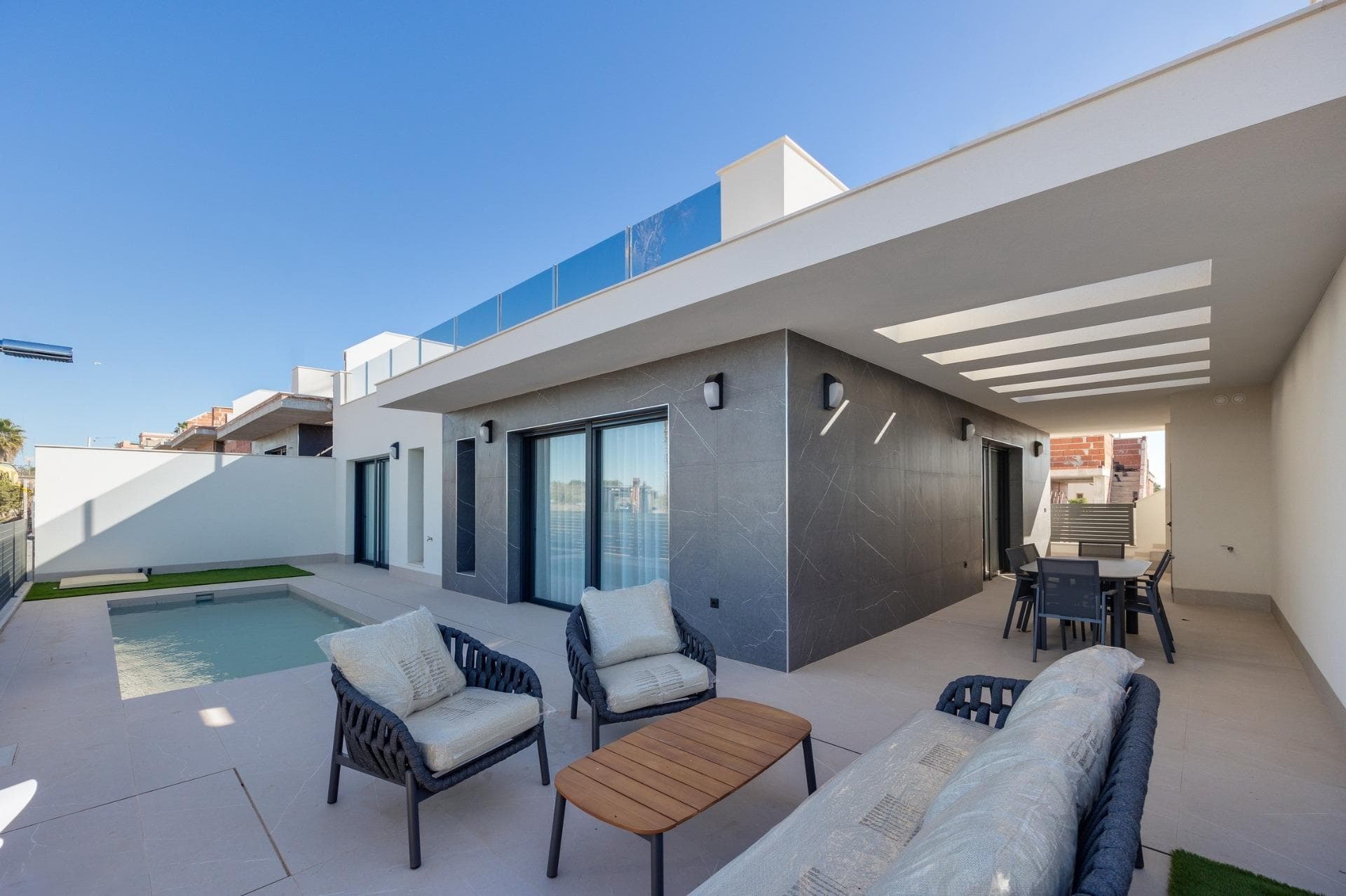 New Villas for Sale in Torrevieja – 2 km from the SeaDiscover these stunning new villas located in the sought-after area of Torrevieja, just 2 km from the Mediterranean coast. Offering the perfect blend of luxury, comfort, and practicality, these 3-bedroom, 2-bathroom homes are designed for those who seek a sophisticated lifestyle with all the benefits of coastal living.Spacious Design and High-Quality FinishesThese one-story villas have been thoughtfully designed for maximum comfort and ease of living. With an open-plan layout, they provide ample space for relaxation and entertainment. The villas feature high-quality finishes including thermal break aluminum windows, Climalit double glazing, and pre-installation for ducted air conditioning. For added convenience, the homes include electric shutters, modern bathrooms with resin shower trays and built-in black faucets, and private parking in the underground garage with additional storage space.Private Pool and Solarium with Stunning ViewsStep outside to your private oasis, where you can enjoy the luxury of a private pool in your own garden. From the rooftop solarium, take in the breathtaking views of the La Mata Salt Lagoon and the surrounding area, and enjoy spectacular sunsets each evening. The property is situated in the highest part of Torrevieja, ensuring both privacy and impressive vistas.Exclusive Community AmenitiesThe development offers several communal amenities, including landscaped garden areas, a calisthenics circuit, and a petanque area, perfect for both relaxation and recreation. Whether you're enjoying time alone or socializing with neighbors, this villa provides the perfect environment for both peaceful living and vibrant community interaction.Prime Location in TorreviejaThese villas are surrounded by essential services and recreational options. The Alicante-Elche Airport is just 45 minutes by car (43 km), making international travel convenient. For shopping and dining, the Habaneras Shopping Center is only 3 km away, offering a variety of retail stores, restaurants, and entertainment options.Experience the Mediterranean LifestyleTorrevieja, on the southern coast of Alicante, boasts over 300 days of sunshine per year and a pleasant average annual temperature of 20°C. The city is renowned for its beautiful beaches, vibrant promenades, and delicious Mediterranean cuisine, making it the perfect place for both relaxation and adventure. With its family-friendly activities and rich cultural heritage, Torrevieja promises a fulfilling lifestyle year-round.Your Dream Home AwaitsDon't miss the chance to own a luxury villa in one of Spain's most desirable coastal cities. Whether you're looking for a permanent residence or a holiday retreat, this exclusive development offers the ideal setting to experience the best of Mediterranean living. Schedule a viewing today and take the first step toward making your dream home a reality!