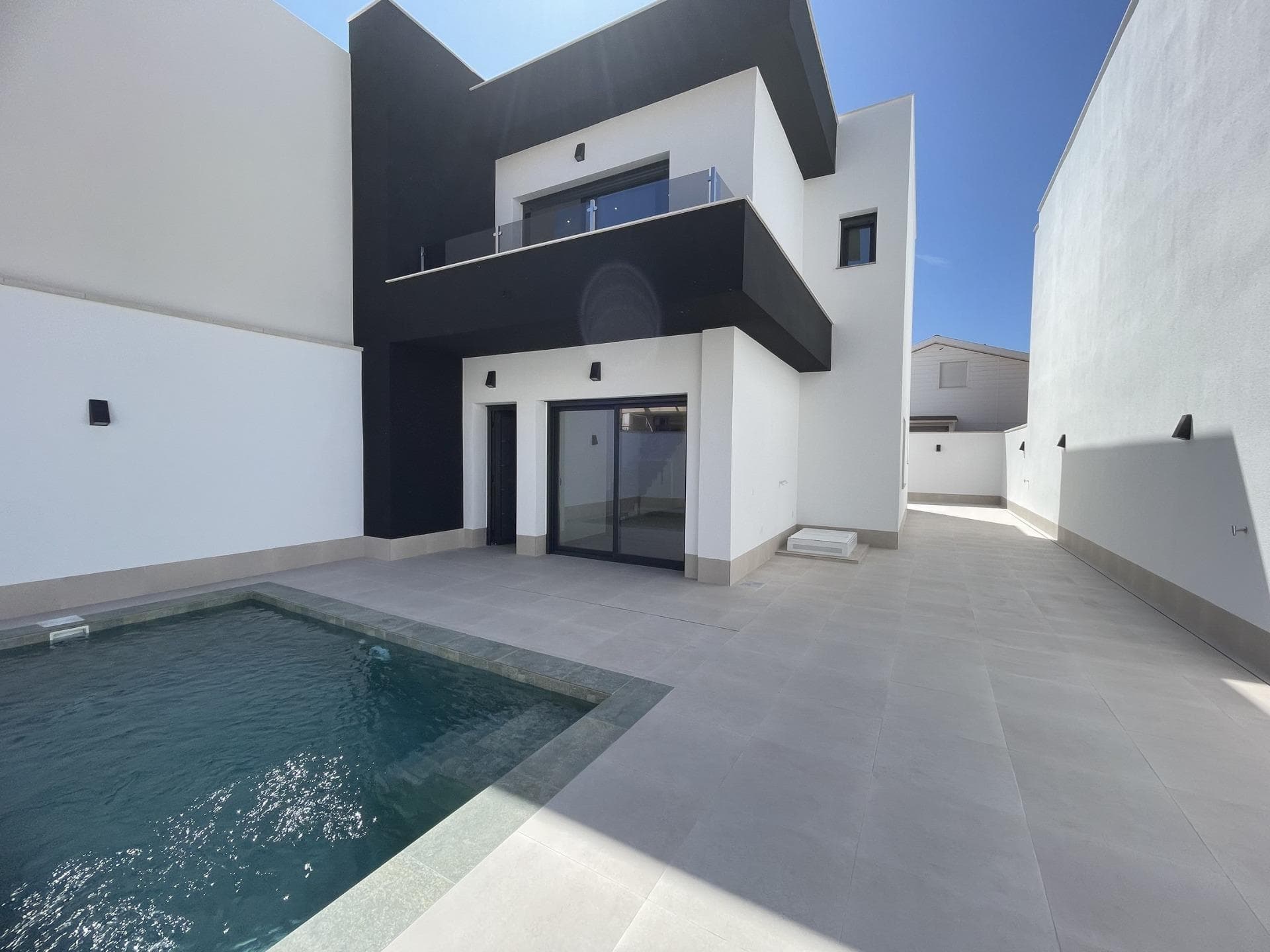 New Build Villas for Sale in Las Heredades, Costa BlancaModern Villas in a Peaceful and Well-Connected AreaDiscover this exclusive development of 5 contemporary villas located in Las Heredades, a charming and quiet village near Rojales and Almoradí, in the heart of the Costa Blanca South. This peaceful residential area offers an authentic Spanish lifestyle surrounded by nature while remaining close to all amenities, golf courses, and the Mediterranean beaches of Guardamar del Segura and Torrevieja, just 12 km away.Elegant and Functional DesignThese newly built villas feature a modern Mediterranean design that combines comfort, style, and practicality. Each property is distributed over two floors, offering bright and spacious interiors that blend seamlessly with outdoor living spaces.The villas include 3 bedrooms and 3 bathrooms, an open-plan kitchen with fully integrated appliances, and a spacious living-dining area with direct access to the terrace and garden. Built with high-quality materials and attention to detail, these homes ensure a comfortable and energy-efficient lifestyle all year round.Private Outdoor Spaces and Premium FeaturesEach villa is built on its own private plot with:Private swimming pool (6x3 m)Landscaped garden with automatic irrigation systemPrivate parking space for two vehiclesTerraces and outdoor seating areas perfect for enjoying the Mediterranean climateAdditional features include:Air conditioning through ductsLED lighting throughout the interior and exteriorBuilt-in wardrobes in all bedroomsFully furnished kitchen with modern appliancesA Perfect Location for Relaxed Mediterranean LivingLas Heredades is ideal for those seeking tranquility without giving up proximity to beaches, golf, and leisure areas. With its traditional Spanish atmosphere and excellent road connections, this area is perfect for both permanent living and holidays on the Costa Blanca.Distances to key points of interest:Beaches of Guardamar del Segura: 12 kmRojales town center: 3 kmAlmoradí: 2 kmLa Marquesa Golf: 5 kmTorrevieja: 15 kmAlicante International Airport: 40 km (about 45 minutes by car)Murcia Airport (Corvera): 50 kmContact us today to arrange a visit and discover your dream home in Las Heredades, Costa Blanca.